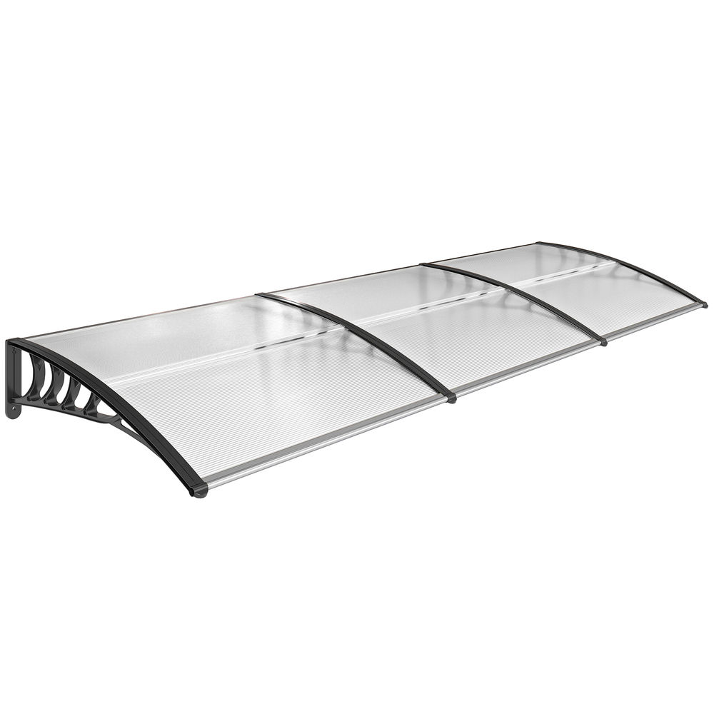 Un toldo transparente con soportes negros, montado en una pared. Tiene forma curva.