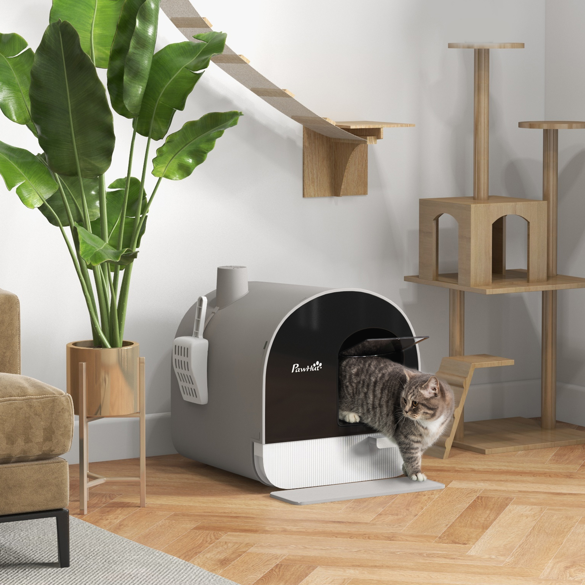 Un gato atigrado sale de una caja de arena autolimpiable gris.