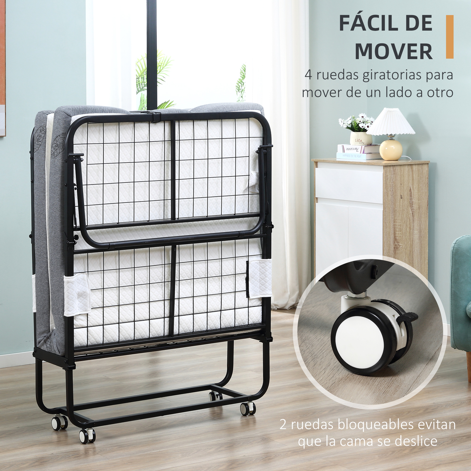 Cama plegable con ruedas sobre suelo de madera, con detalle de una rueda.