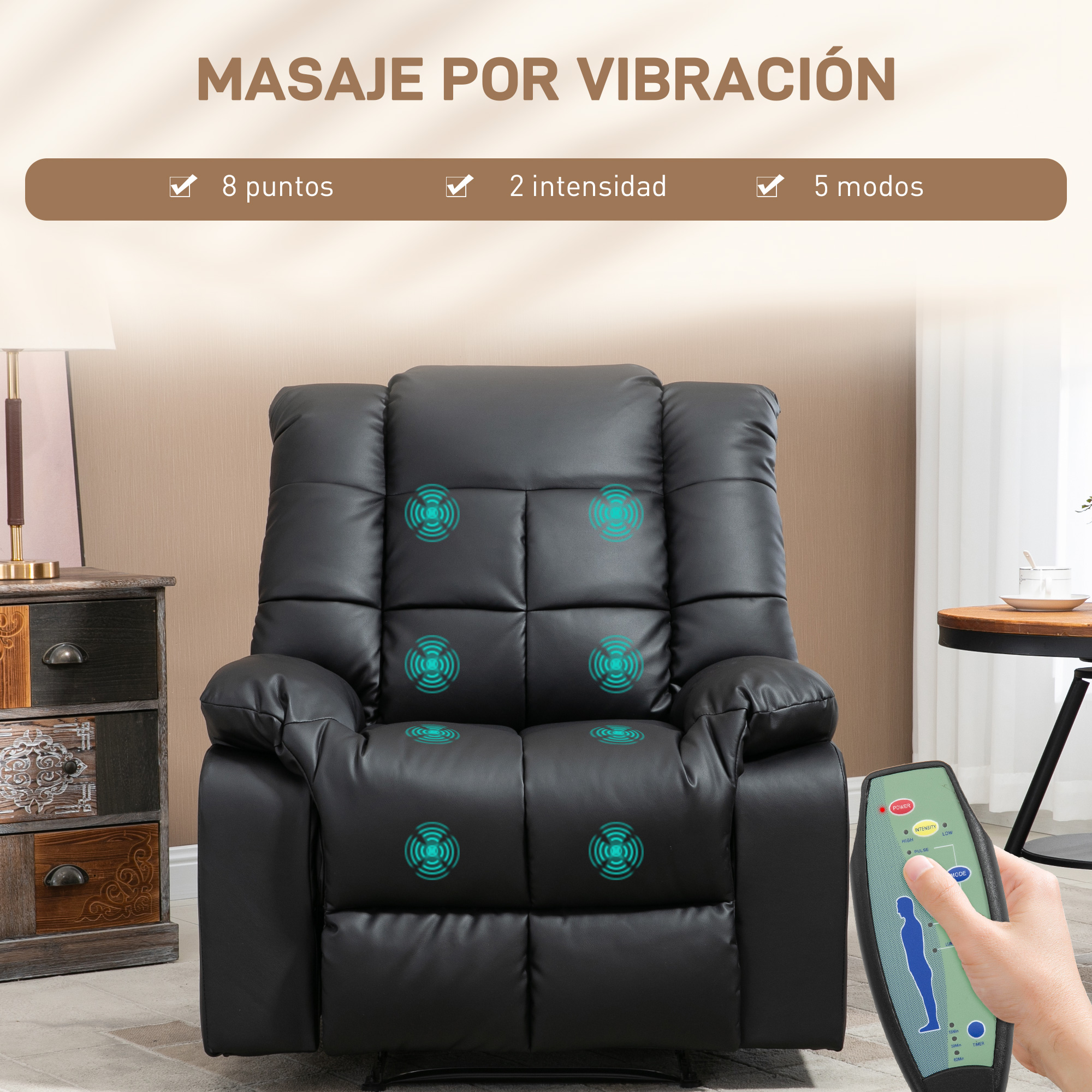 Sillón de masaje negro con iconos de vibración, mando a distancia en mano.