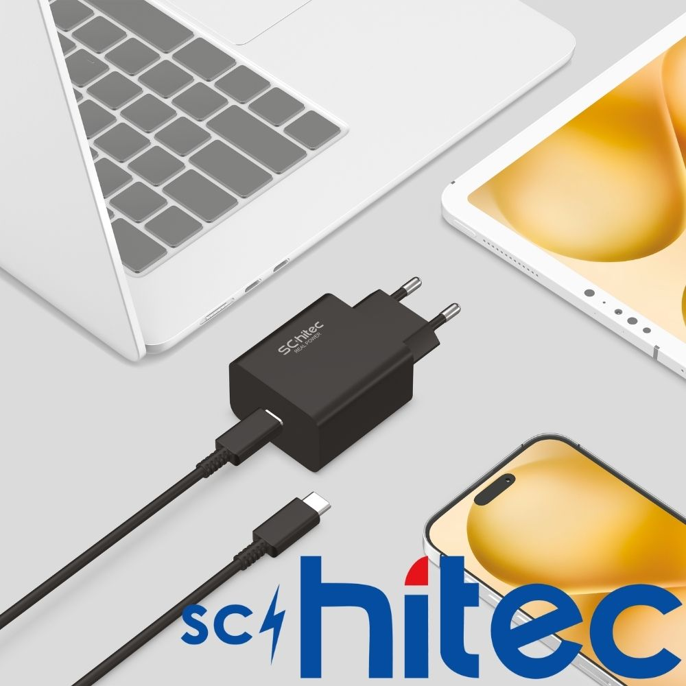 Laptop, tablet ve akıllı telefon yanında USB-C kablolu siyah güç adaptörü.