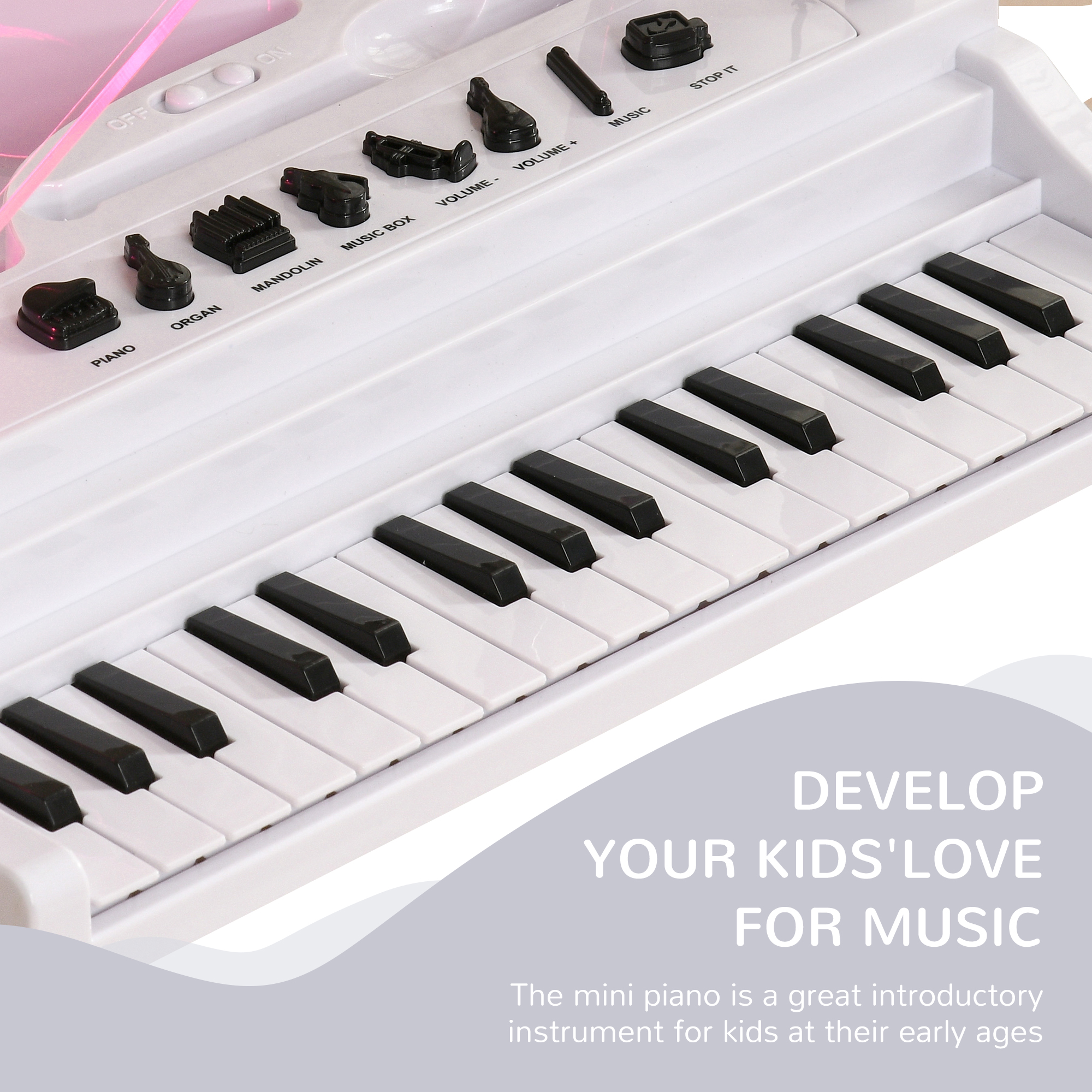 Un mini piano blanco con teclas negras y varios botones.
