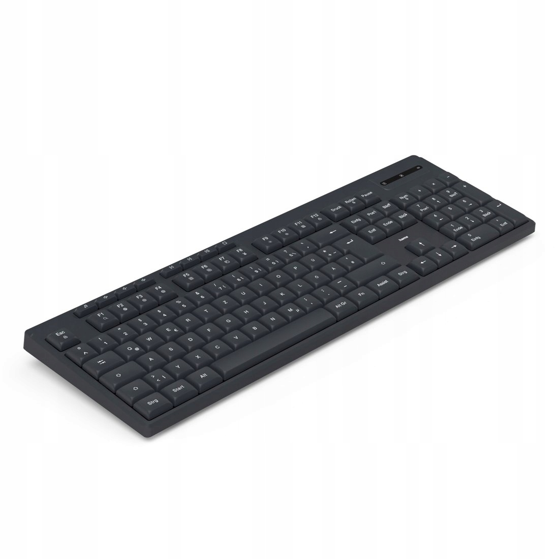 Un teclado completo y oscuro yace sobre un fondo blanco.