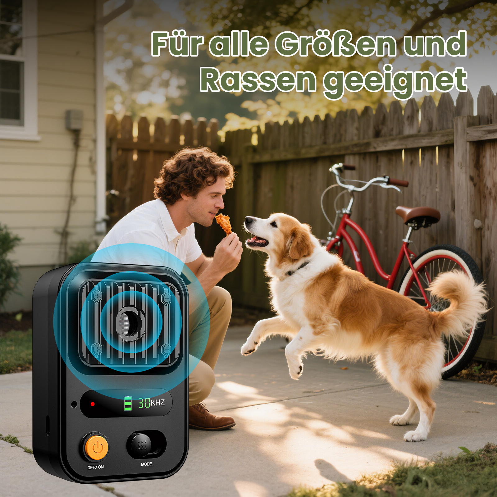 Mann füttert Hund draußen, ein Gerät daneben. Rotes Fahrrad im Hintergrund.