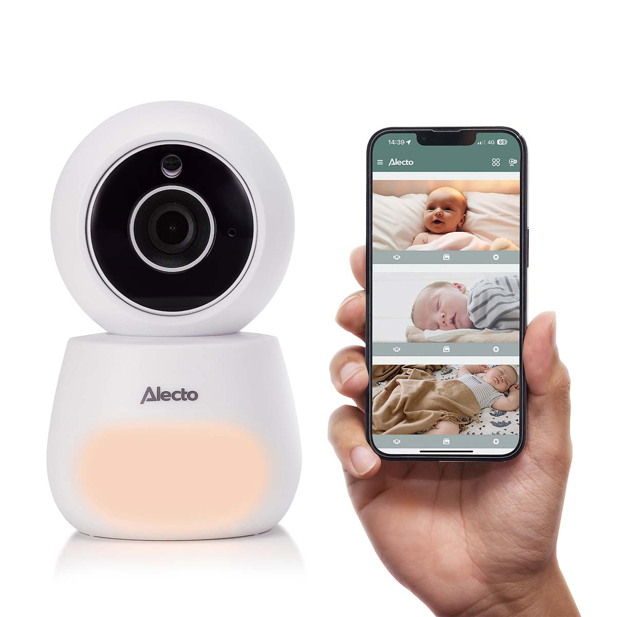 A white baby monitor with a camera next to a smartphone displaying babies.