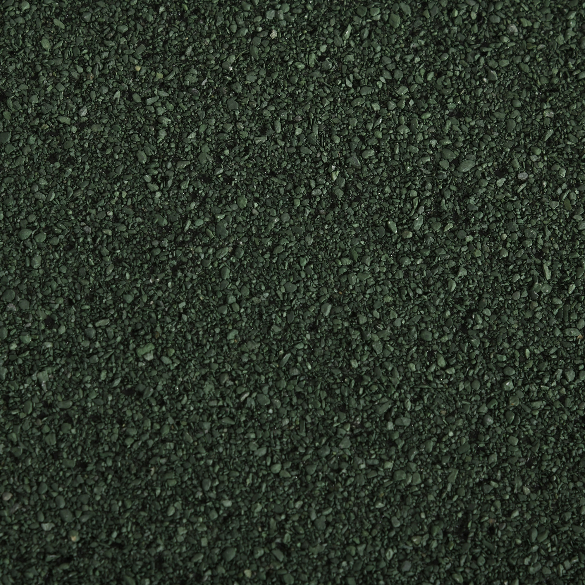 Primer plano de grava verde oscuro con piedras pequeñas.