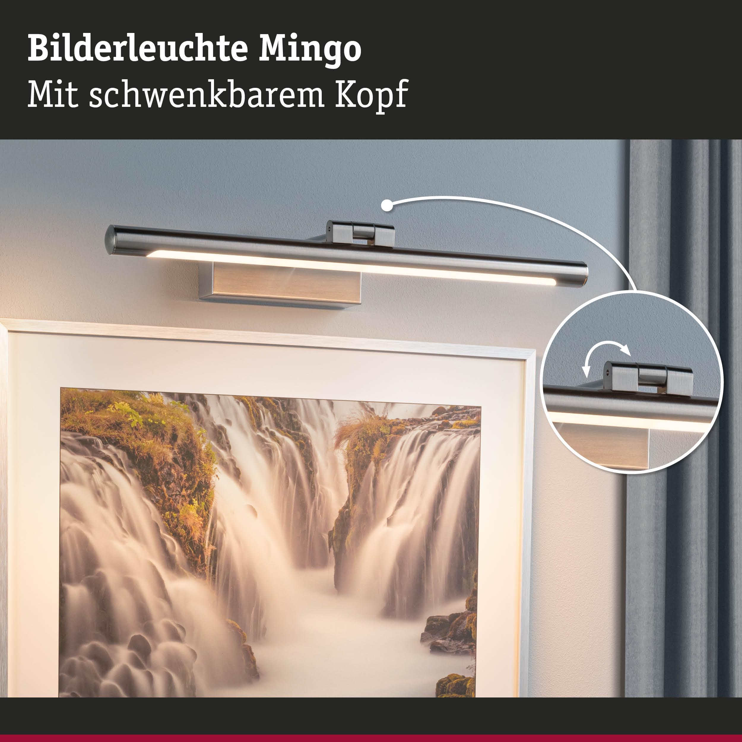 Lampa obrazowa z obrotową głowicą oświetla obraz wodospadu.