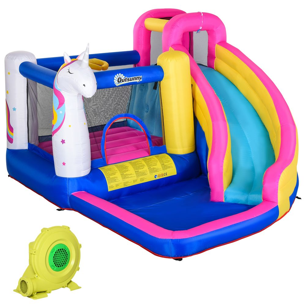 Casa de rebote inflable con tobogán, unicornio y soplador.