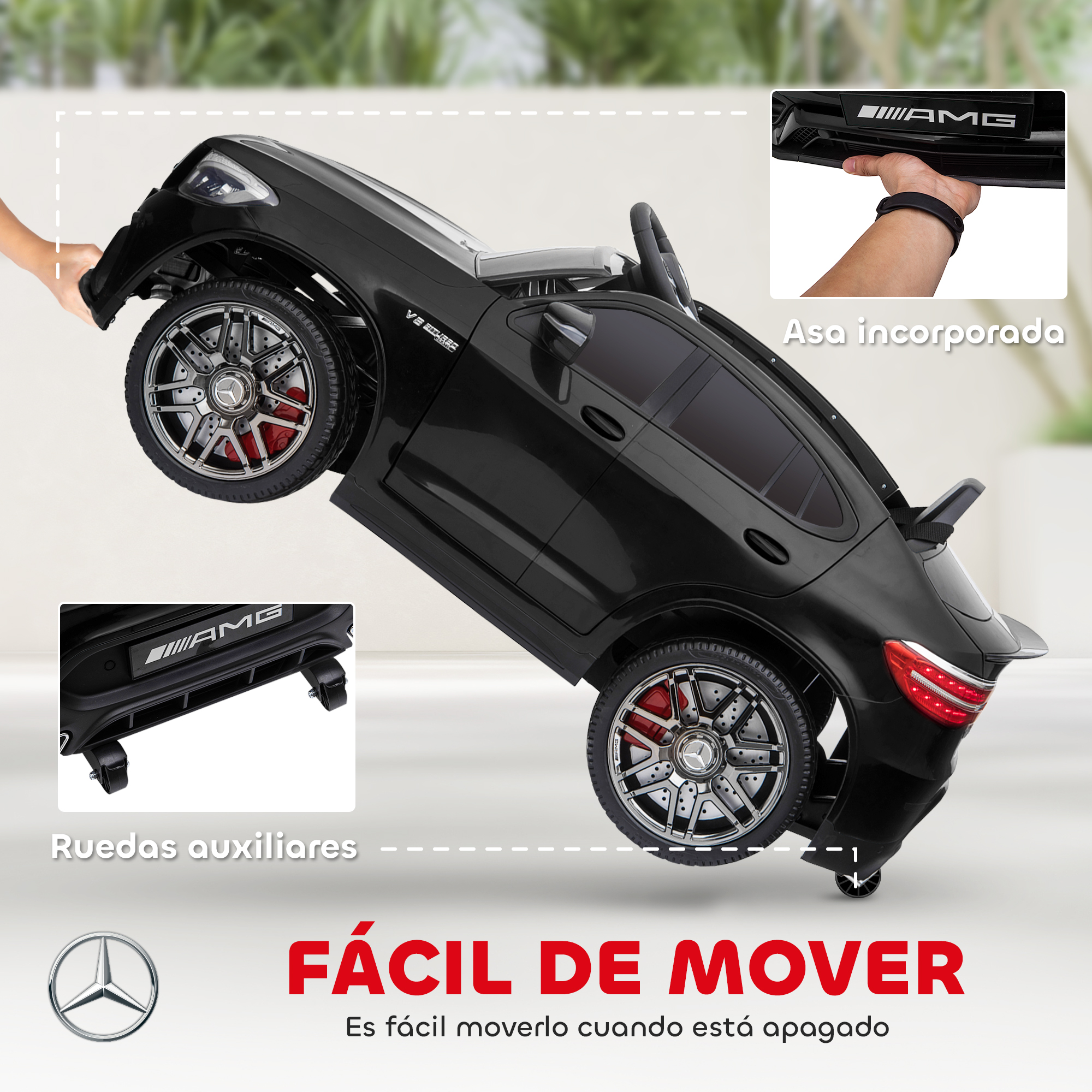 Coche de juguete negro con logo AMG, mostrando asa integrada y ruedas auxiliares.