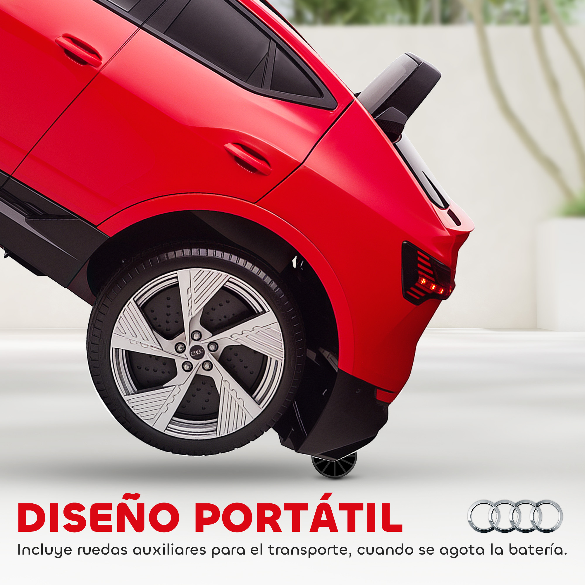Coche de juguete eléctrico Audi rojo con detalles negros y ruedas plateadas.