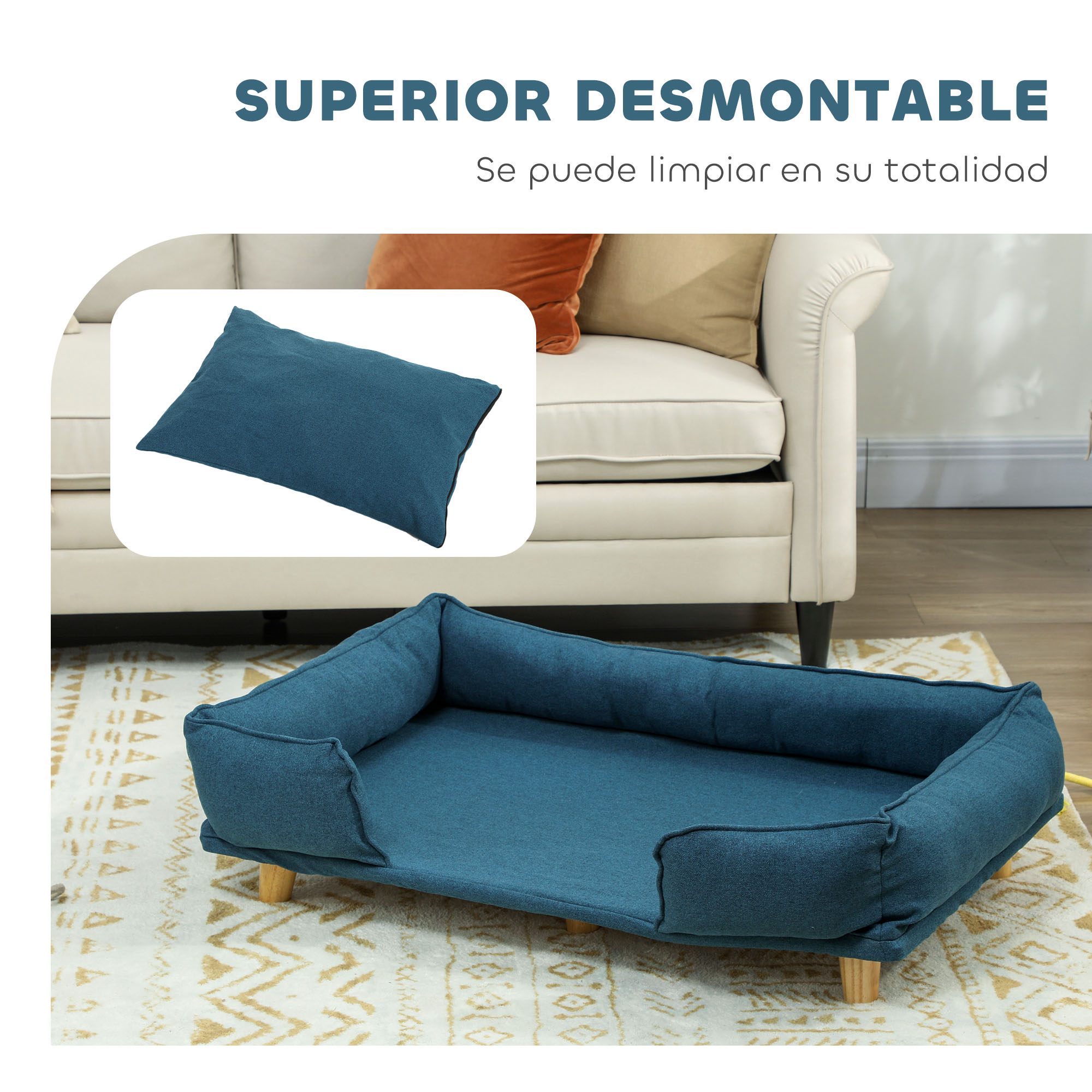 Una cama azul para mascotas sobre una alfombra con patrón geométrico.