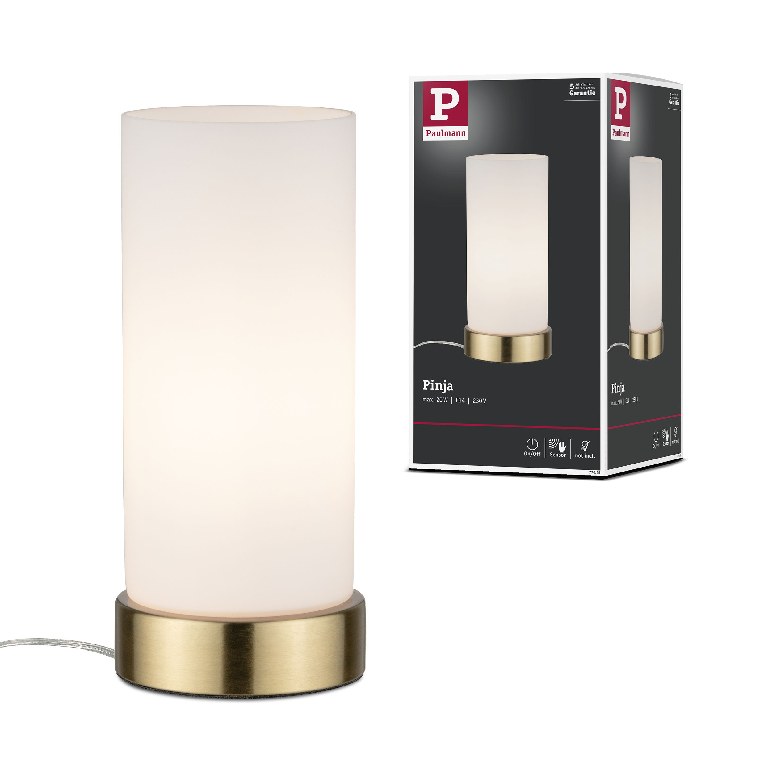 Cylindryczna lampa z białym kloszem i mosiężną podstawą obok opakowania.