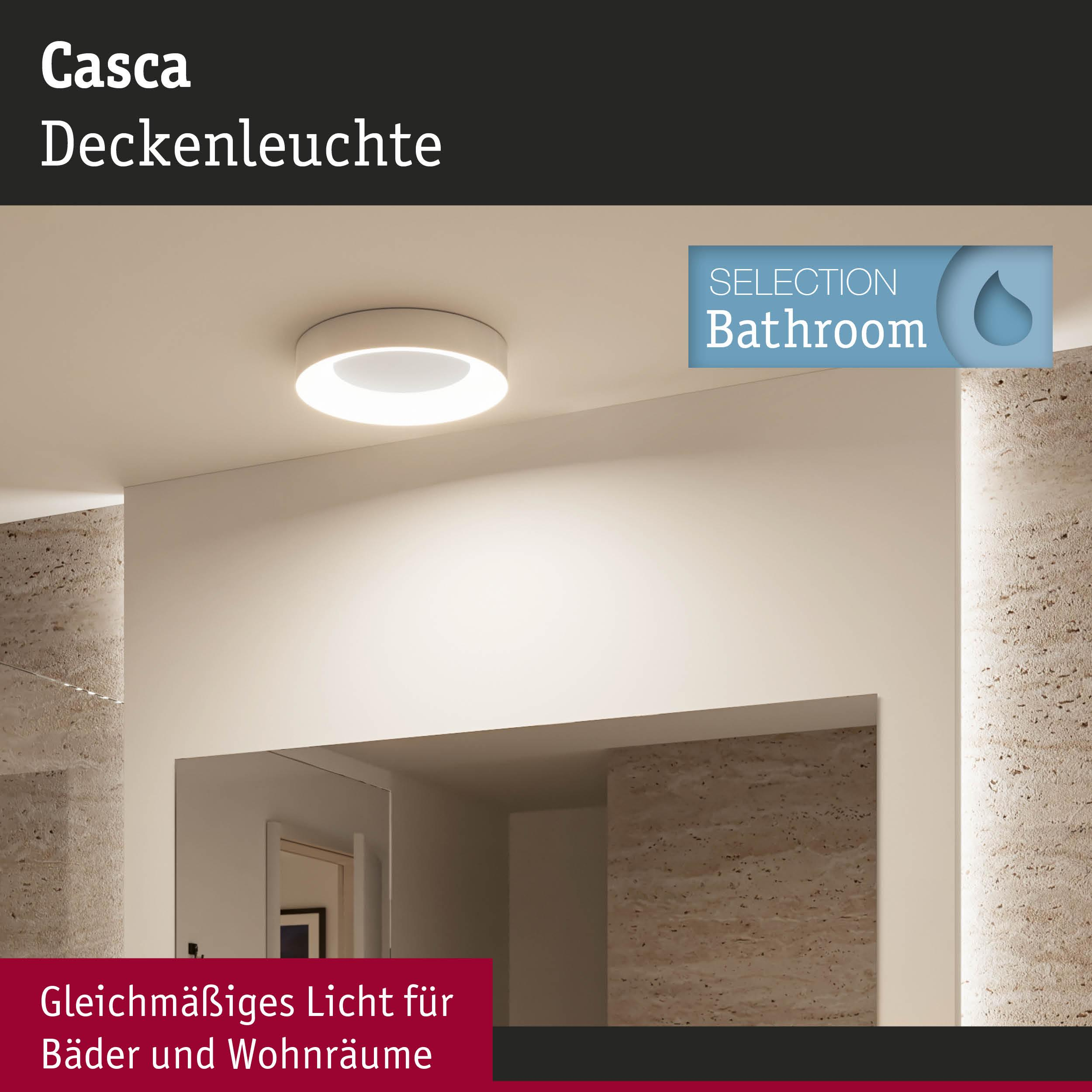 Eine runde Deckenleuchte mit weißem Licht leuchtet über einem Spiegel.