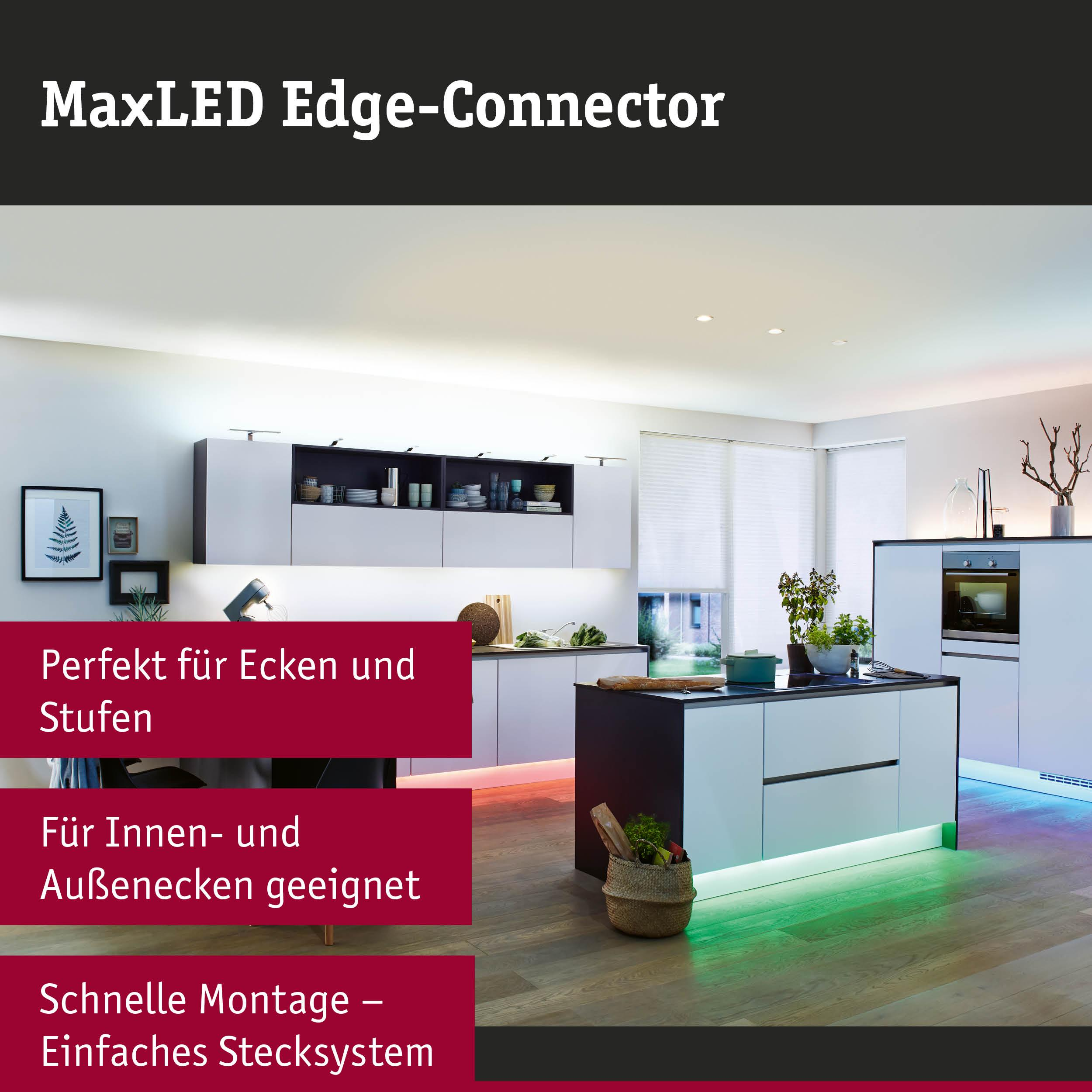 Moderne Küche mit Insel, beleuchtet mit bunten LED-Streifen.