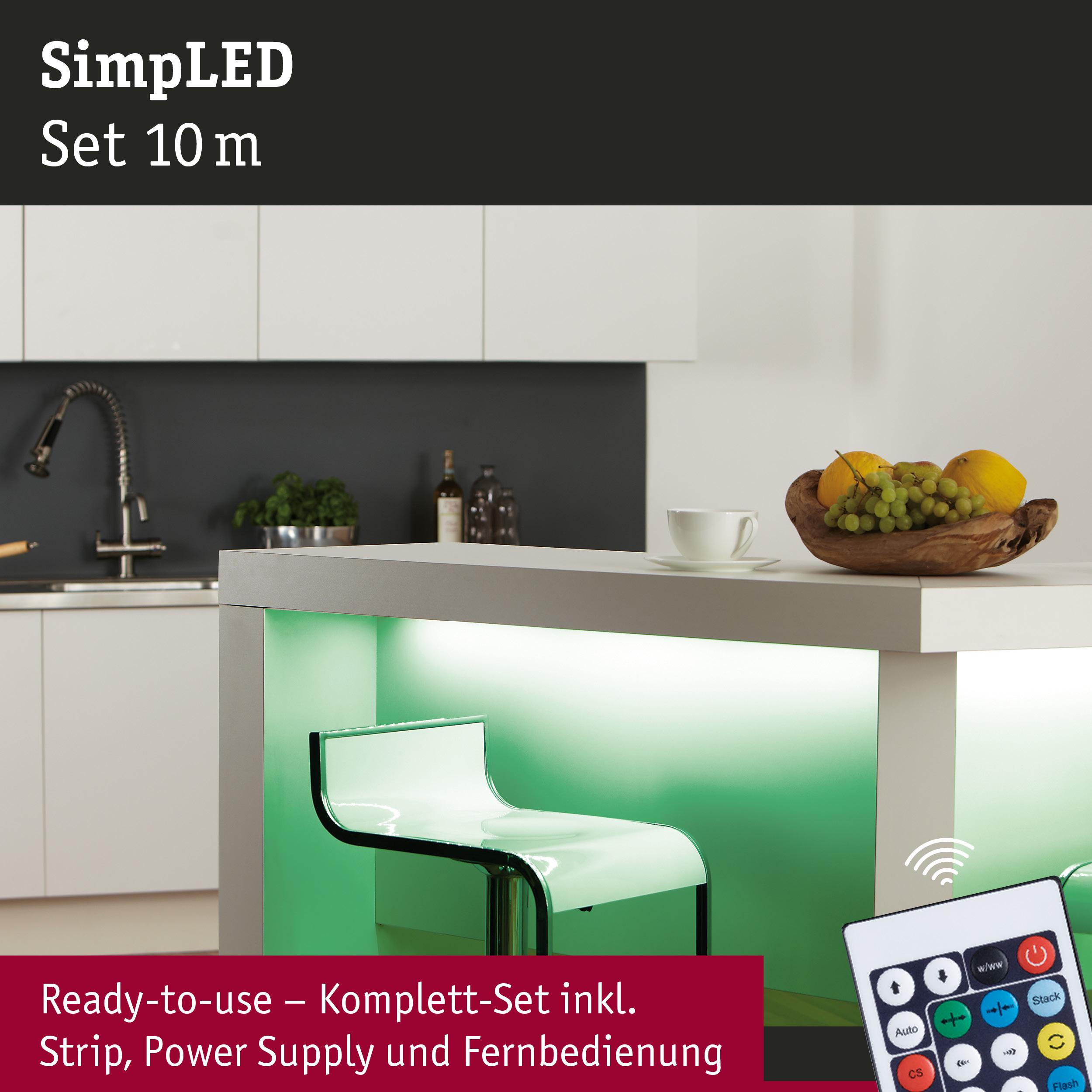 Moderne Küche mit Bar, beleuchtet mit grünen LED-Streifen. Obstschale und Fernbedienung.