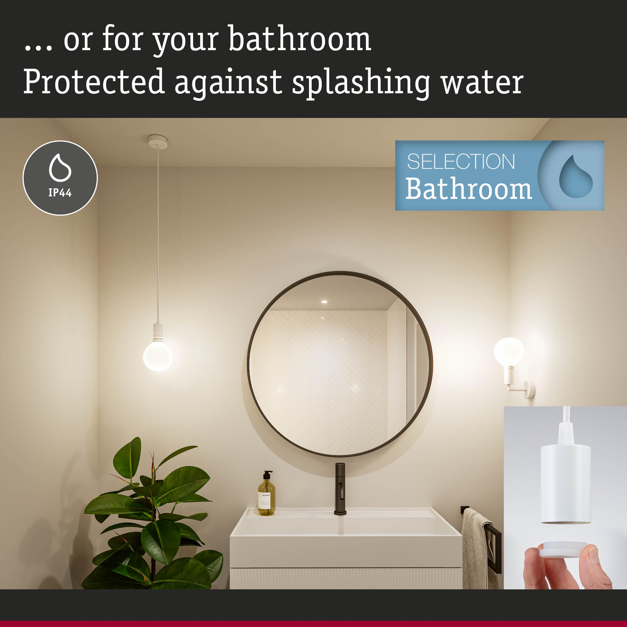 Nowoczesna łazienka z umywalką, lustrem, lampą i rośliną. Klasa IP44.