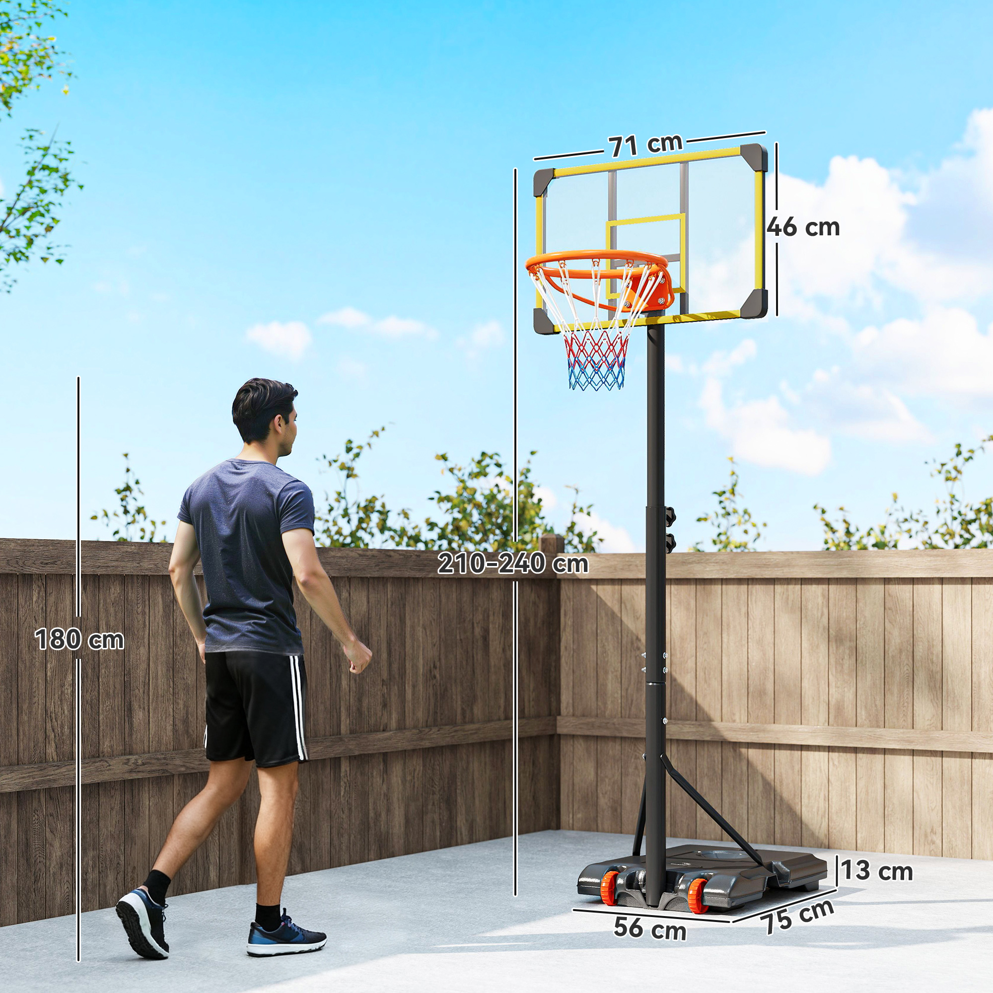 Un hombre está junto a una canasta de baloncesto de altura ajustable al aire libre.