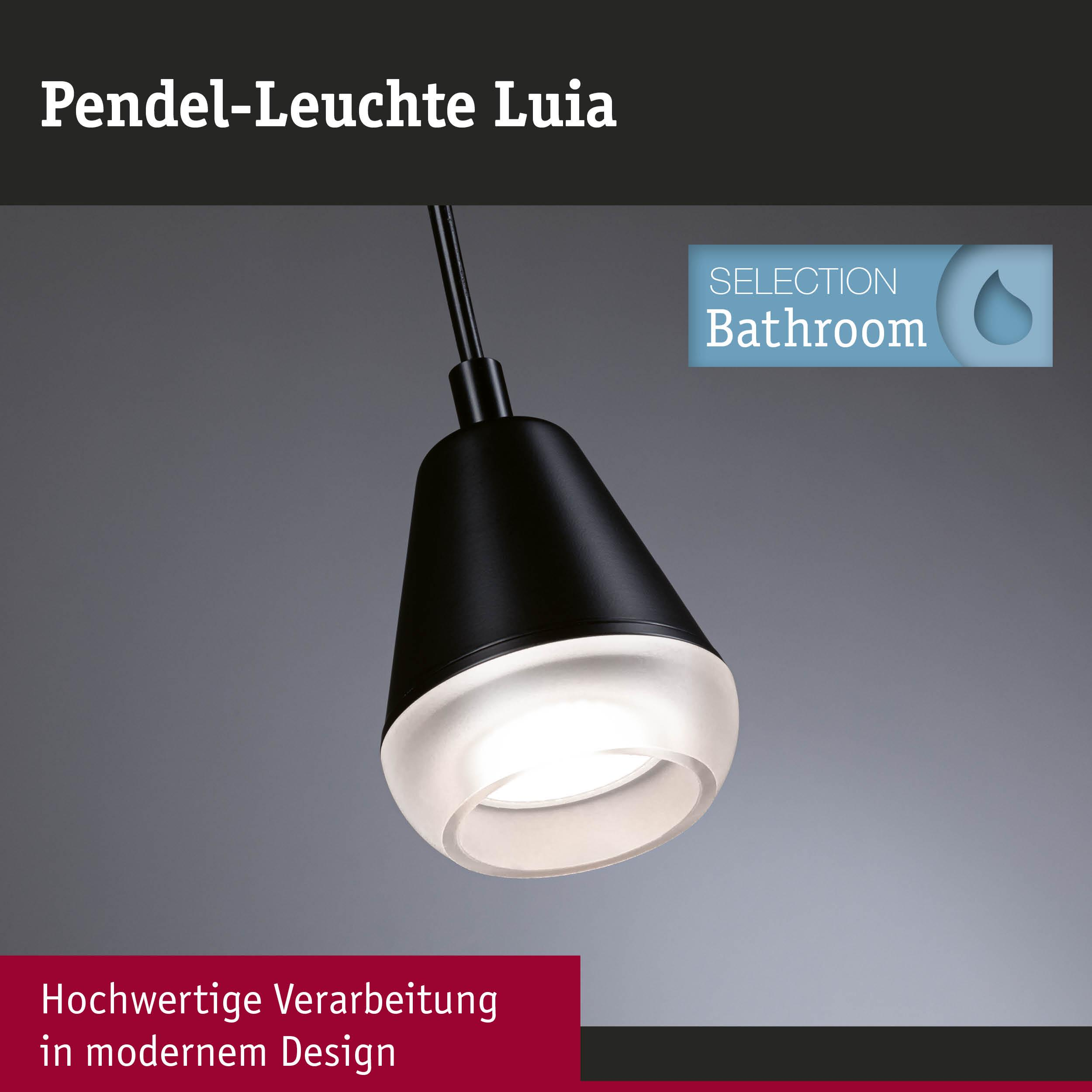 Czarna lampa wisząca z matowym szklanym kloszem wisi na szarym tle.