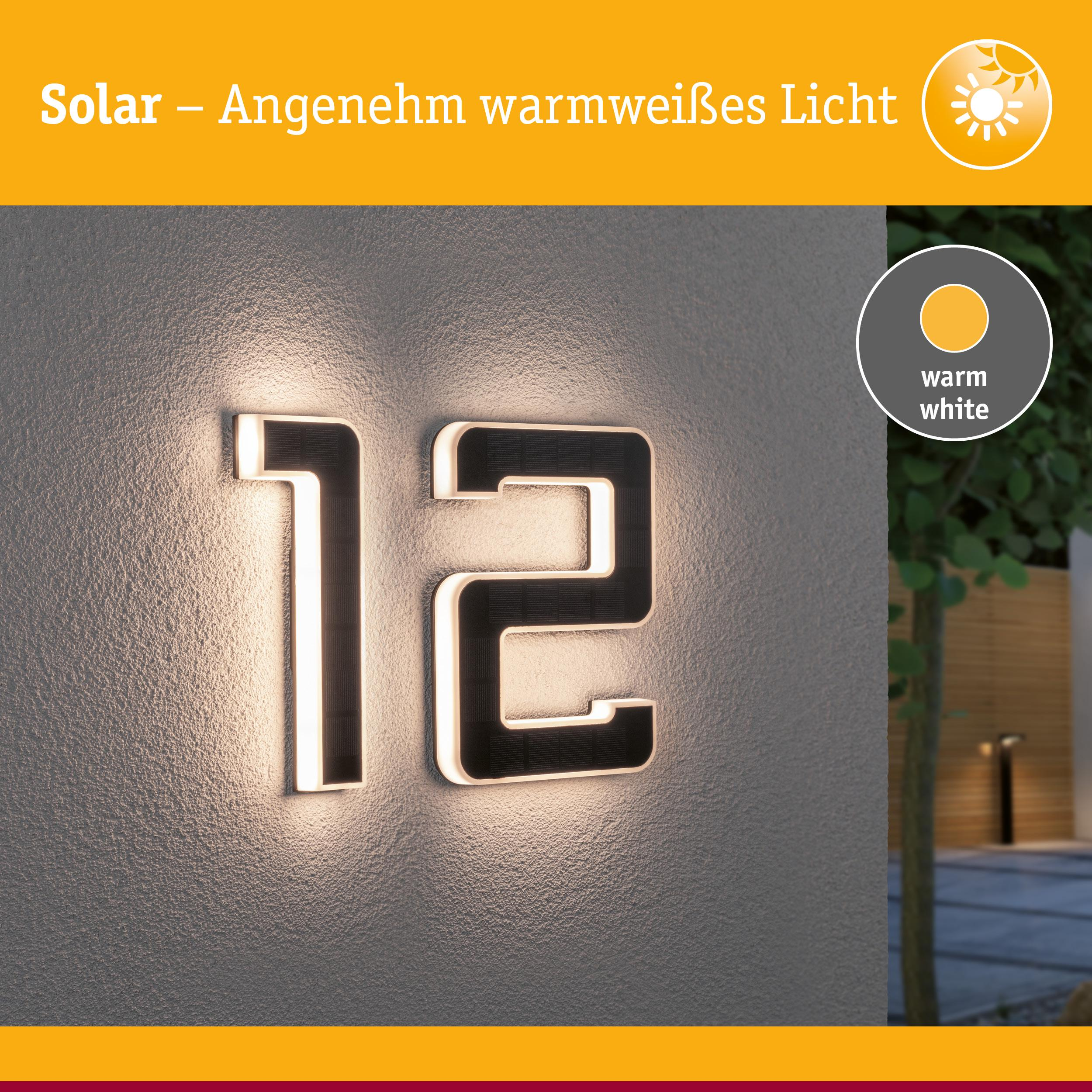 Podświetlany numer domu 12 z technologią solarną w ciepłym białym świetle.