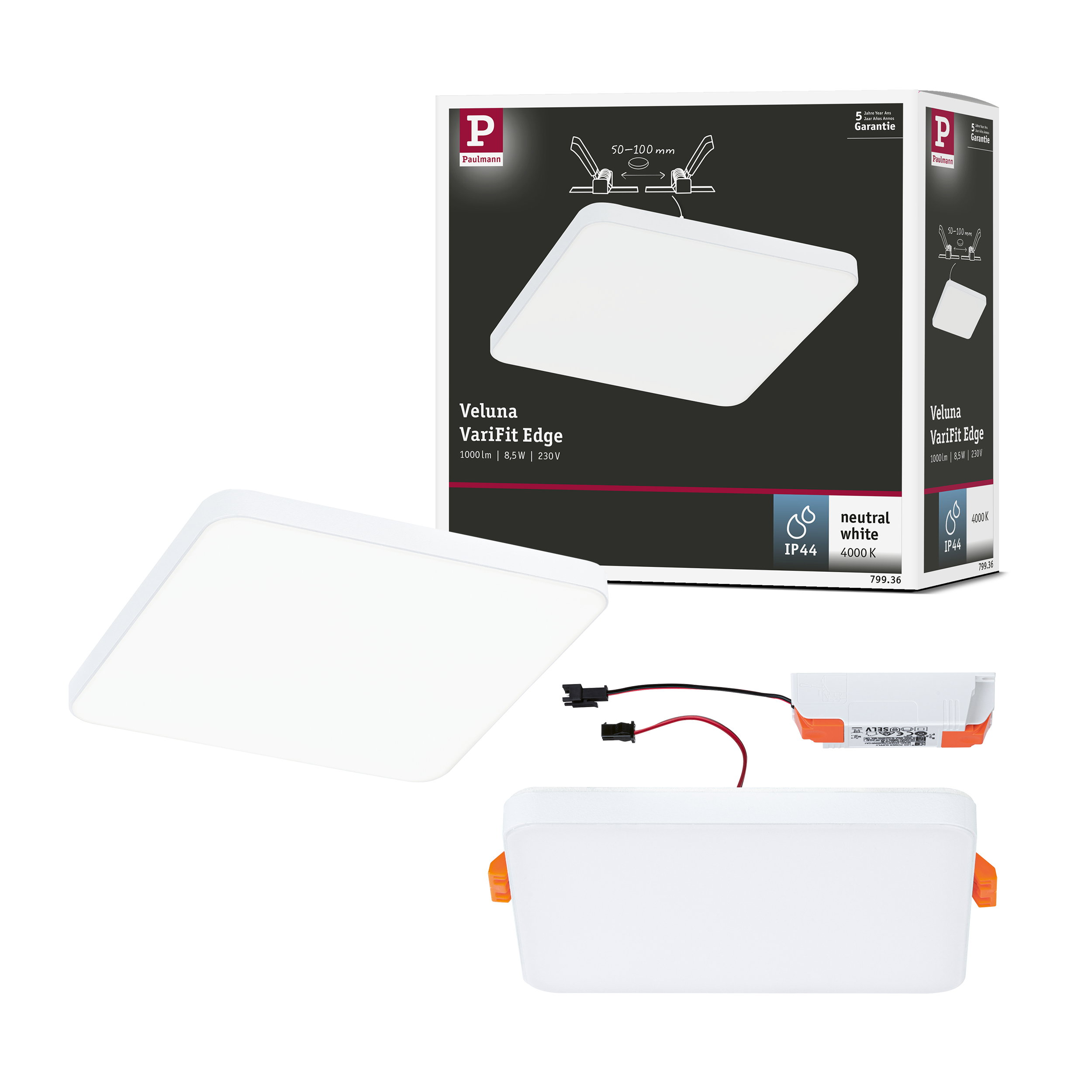 Biała lampa wpuszczana z zasilaczem i instrukcją. Logo Paulmann.