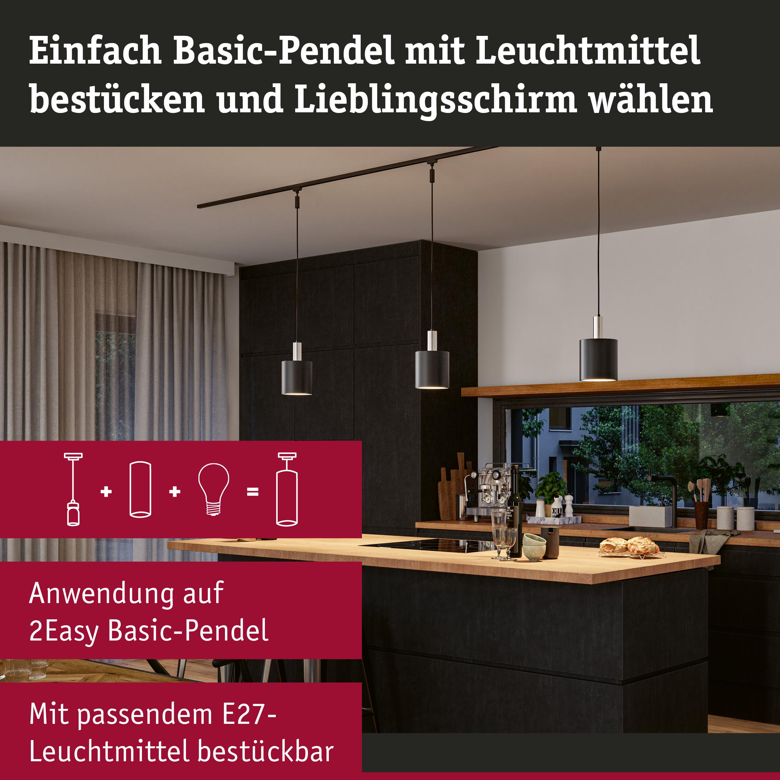 Moderne Küche mit schwarzen Schränken und Hängeleuchten.