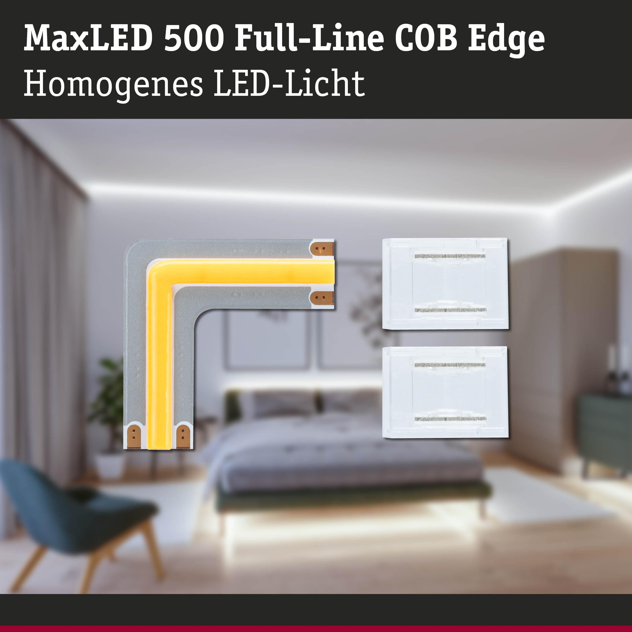 Nahaufnahme einer LED-Leiste mit gelbem Licht in einer Ecke eines Schlafzimmers.