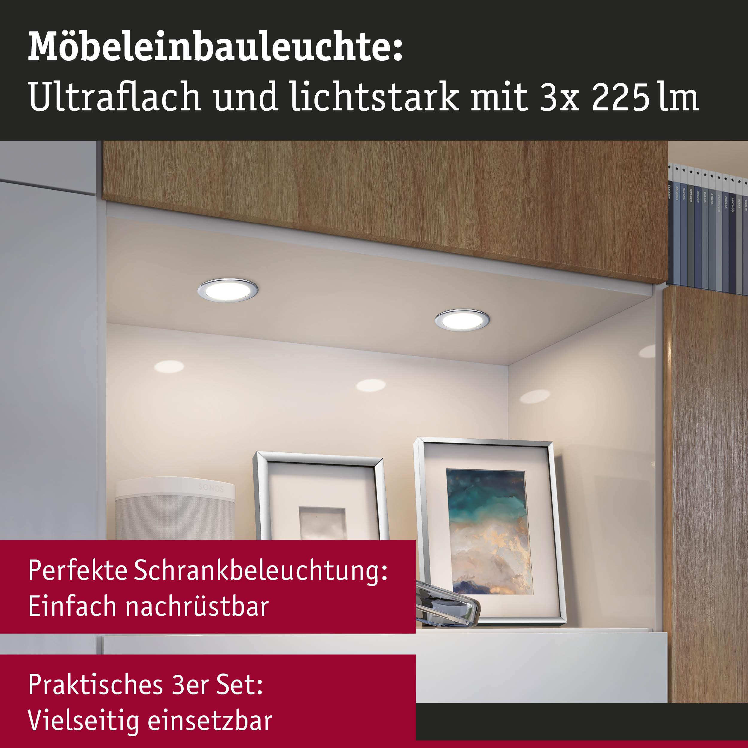 Einbauleuchten in einem Schrank mit Bilderrahmen und Sonos-Lautsprecher.