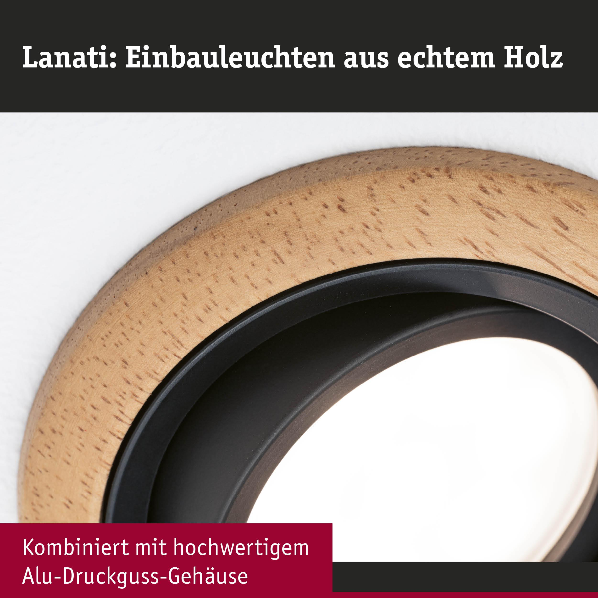 Einbaustrahler aus hellem Holz mit dunklem Ring und Lichtquelle.