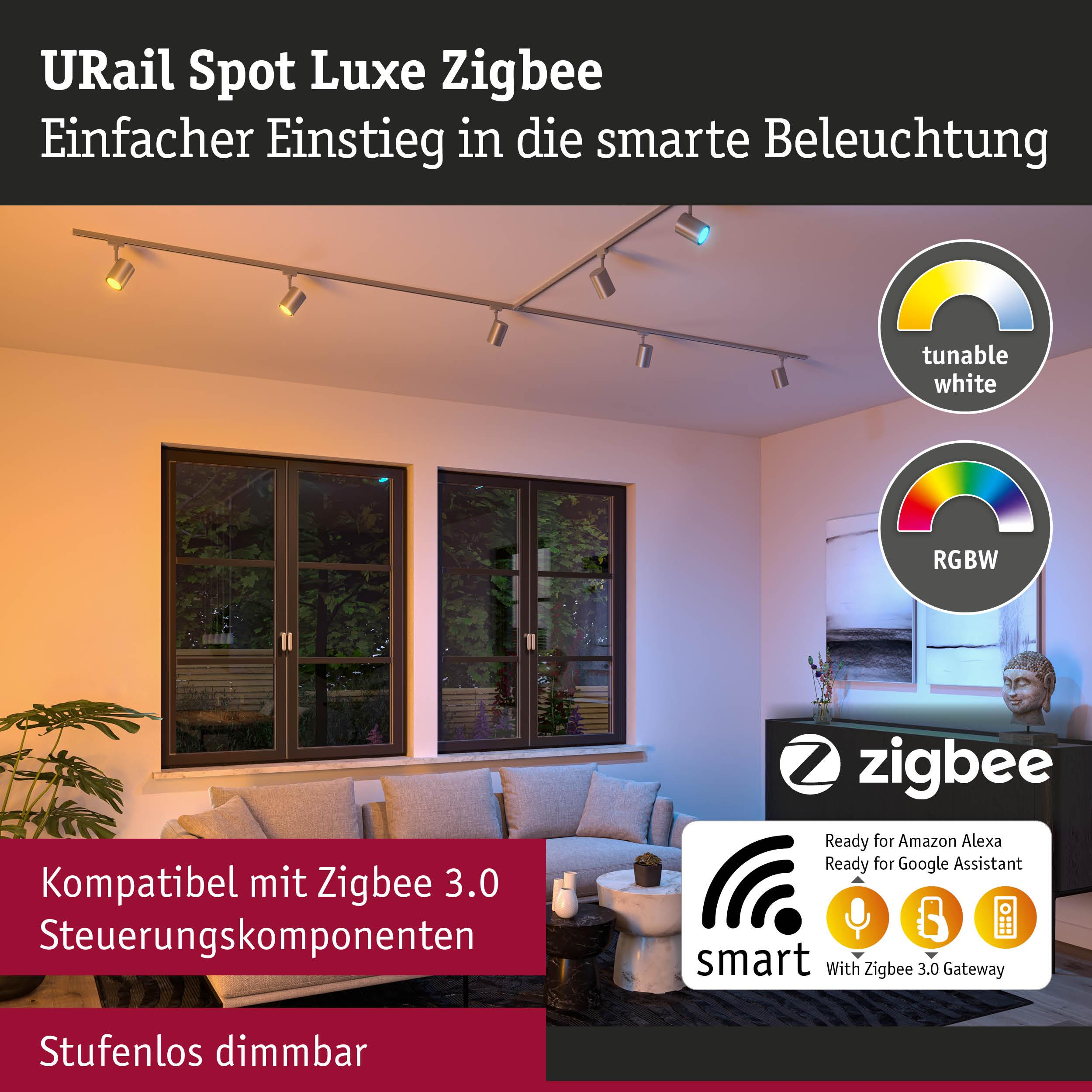 Eine moderne Deckenleiste mit mehreren Spots beleuchtet ein Wohnzimmer.