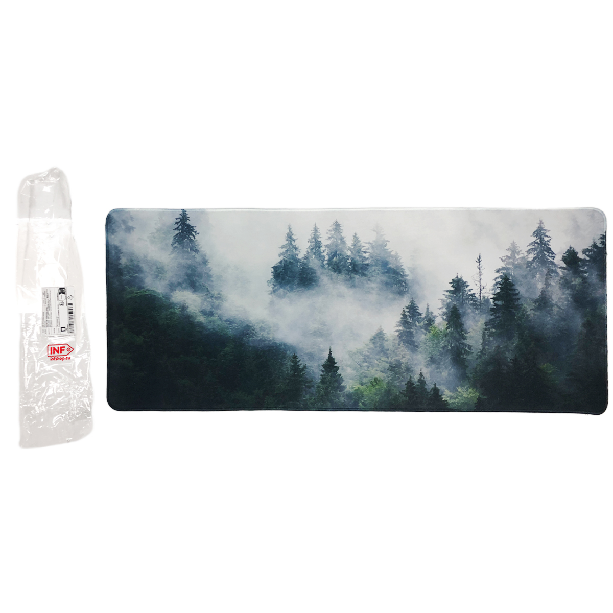 Mistig boslandschap met veel bomen, deels bedekt door mist.