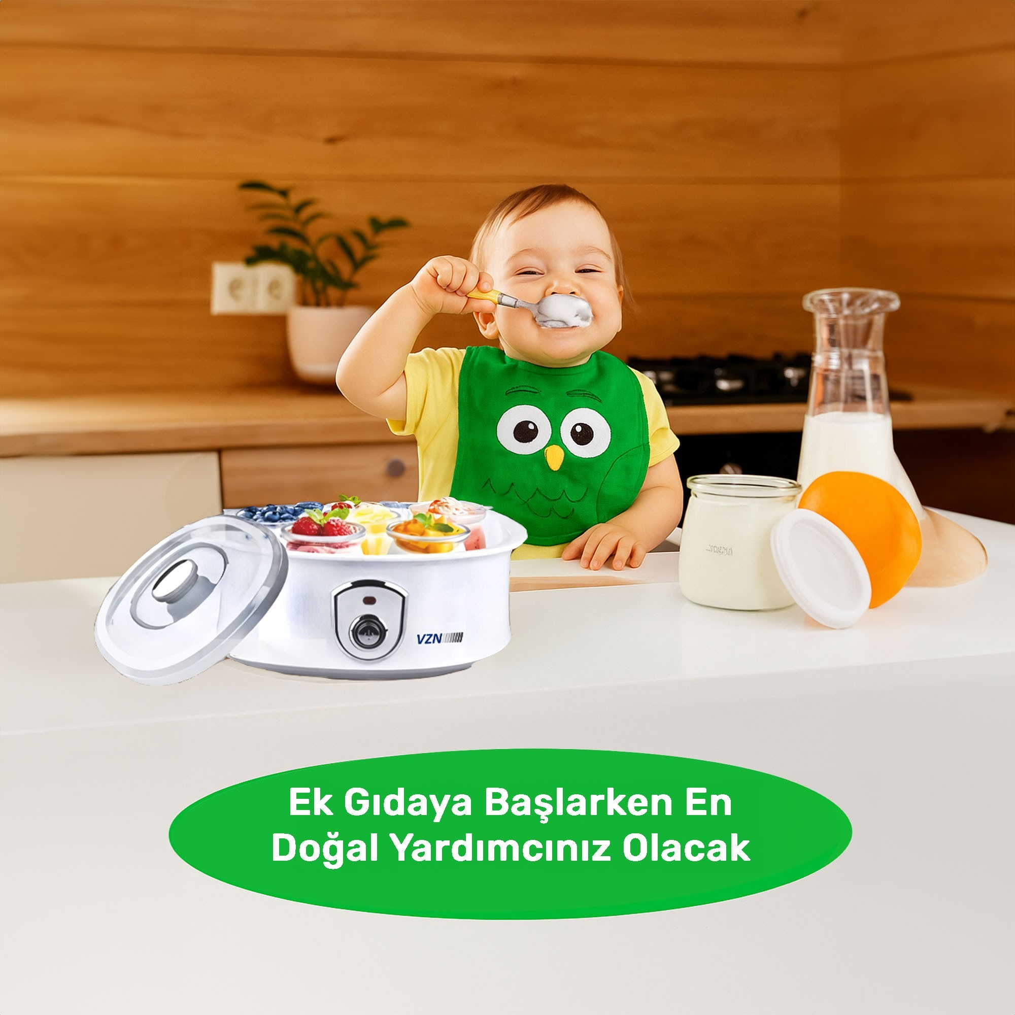 Bebek kaşıkla yoğurt yiyor, yanında yoğurt makinesi, meyve ve süt var.