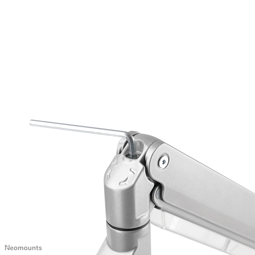 A silver hex key is being screwed into the joint of a silver arm.