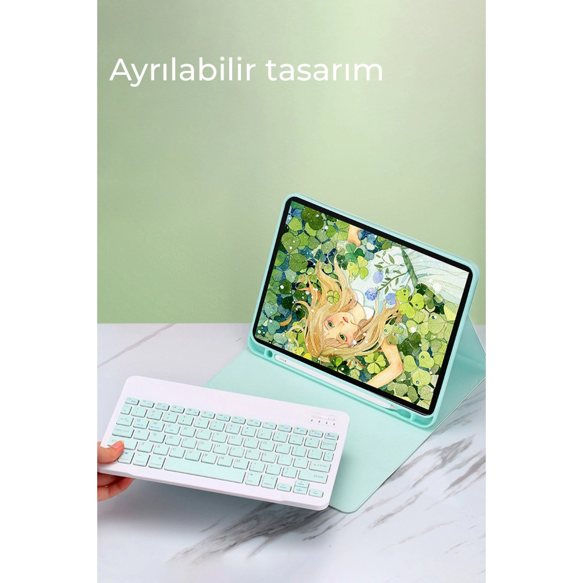 Açıklamalı tablet, açık yeşil stand üzerinde beyaz klavyeli.