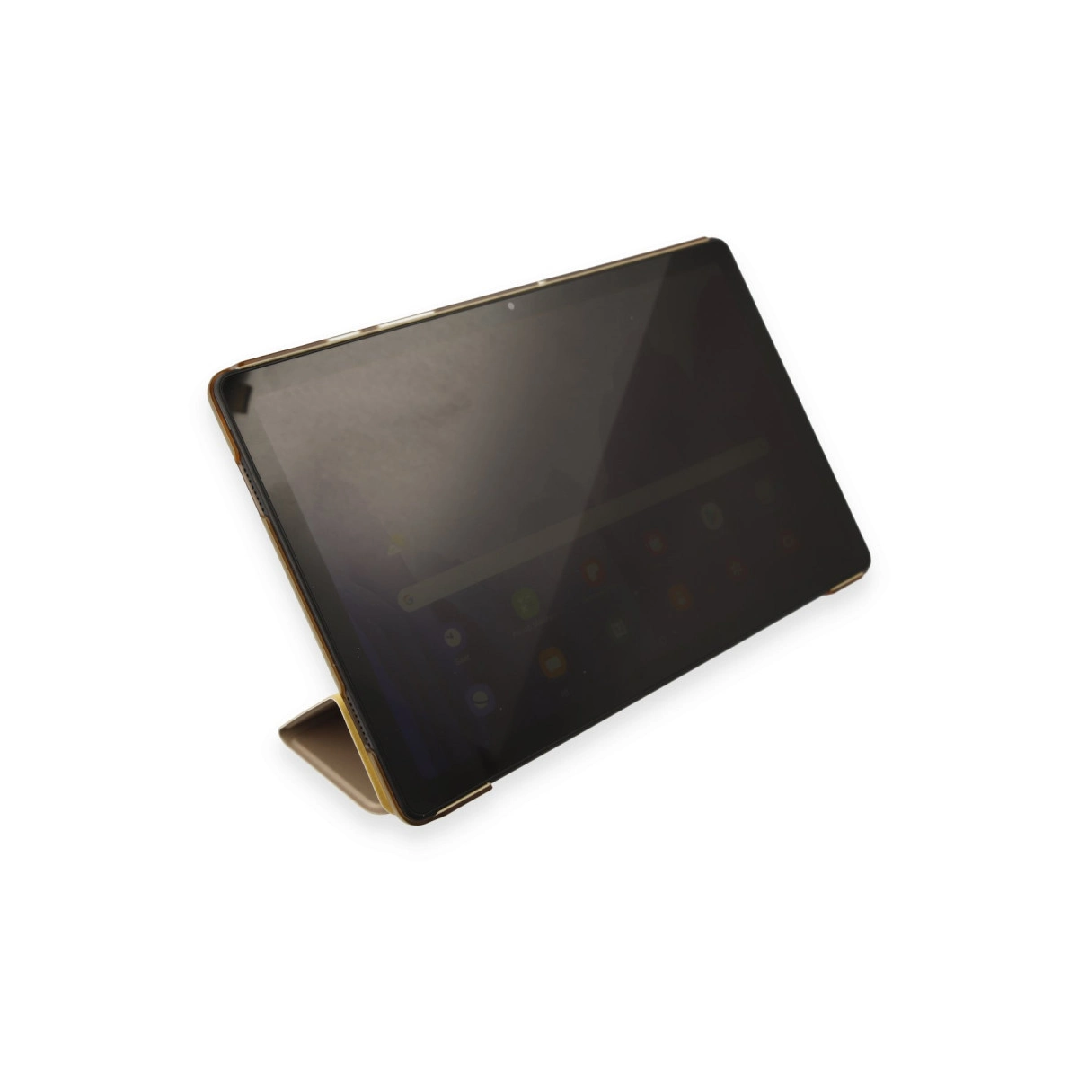 Altın rengi tablet, koyu ekranı ve standıyla duruyor.