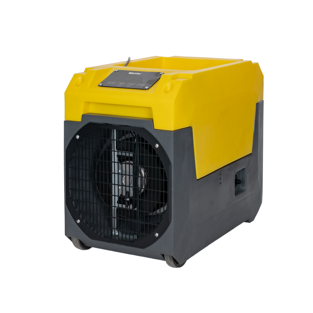 Żółto-szary przenośny wentylator przemysłowy z dużą czarną kratką z przodu i kółkami.
