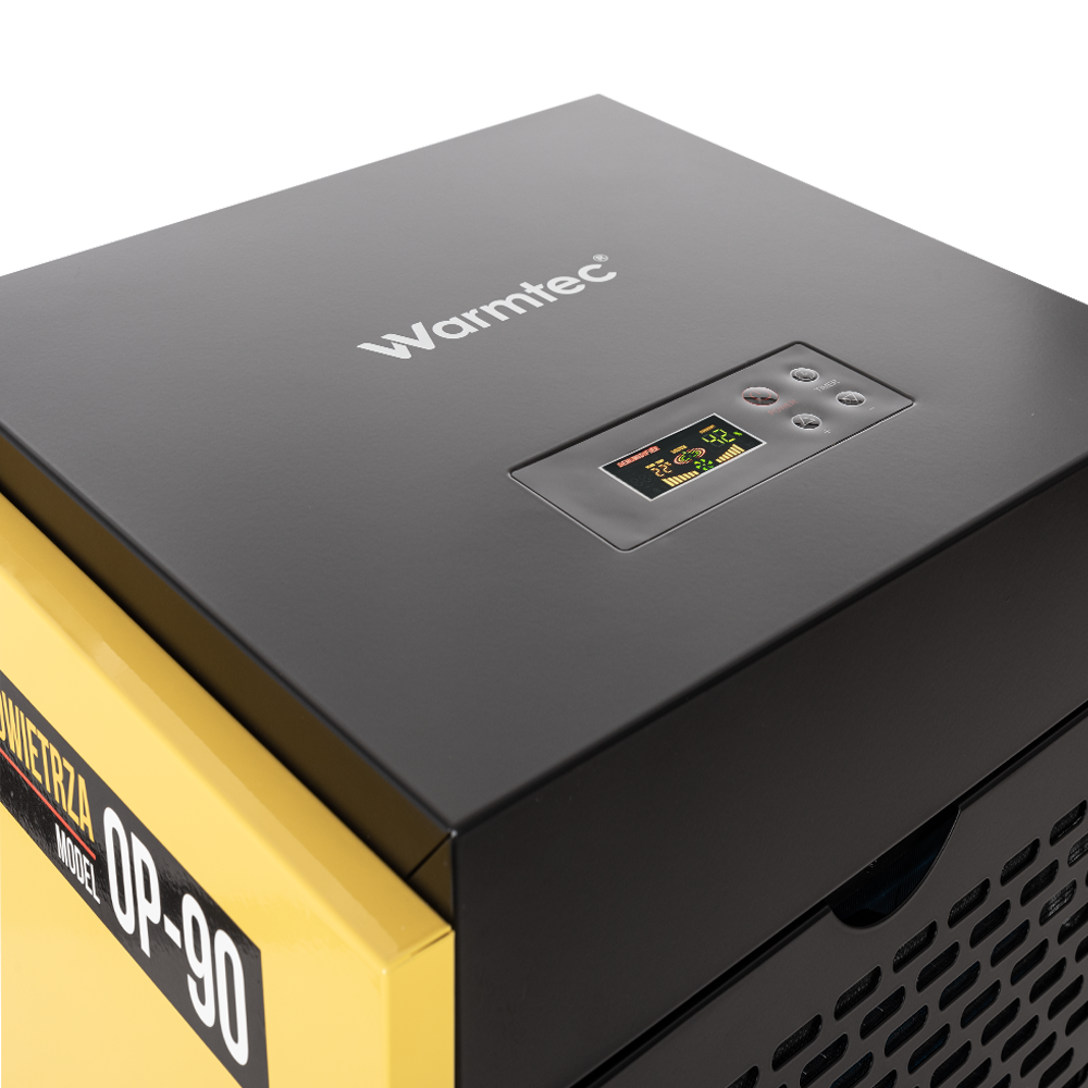 Czarny osuszacz Warmtec z żółtymi akcentami i cyfrowym wyświetlaczem.