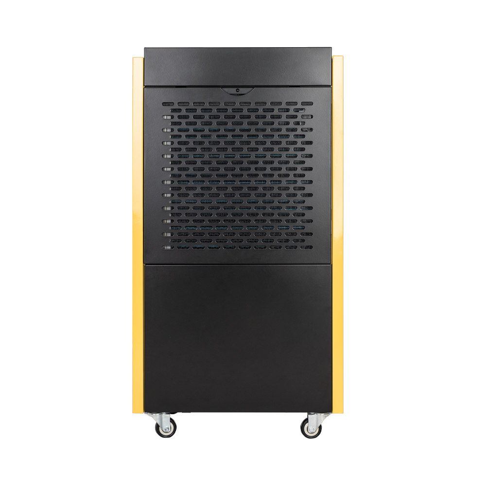 Czarno-żółty osuszacz powietrza z kółkami stoi na białym tle.