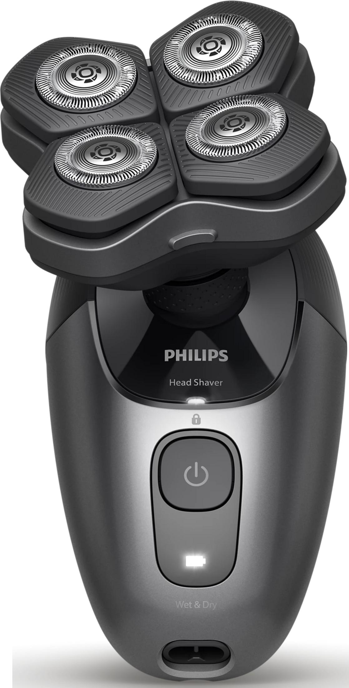 Un rasoio per la testa Philips con quattro unità di taglio e un pulsante di accensione.