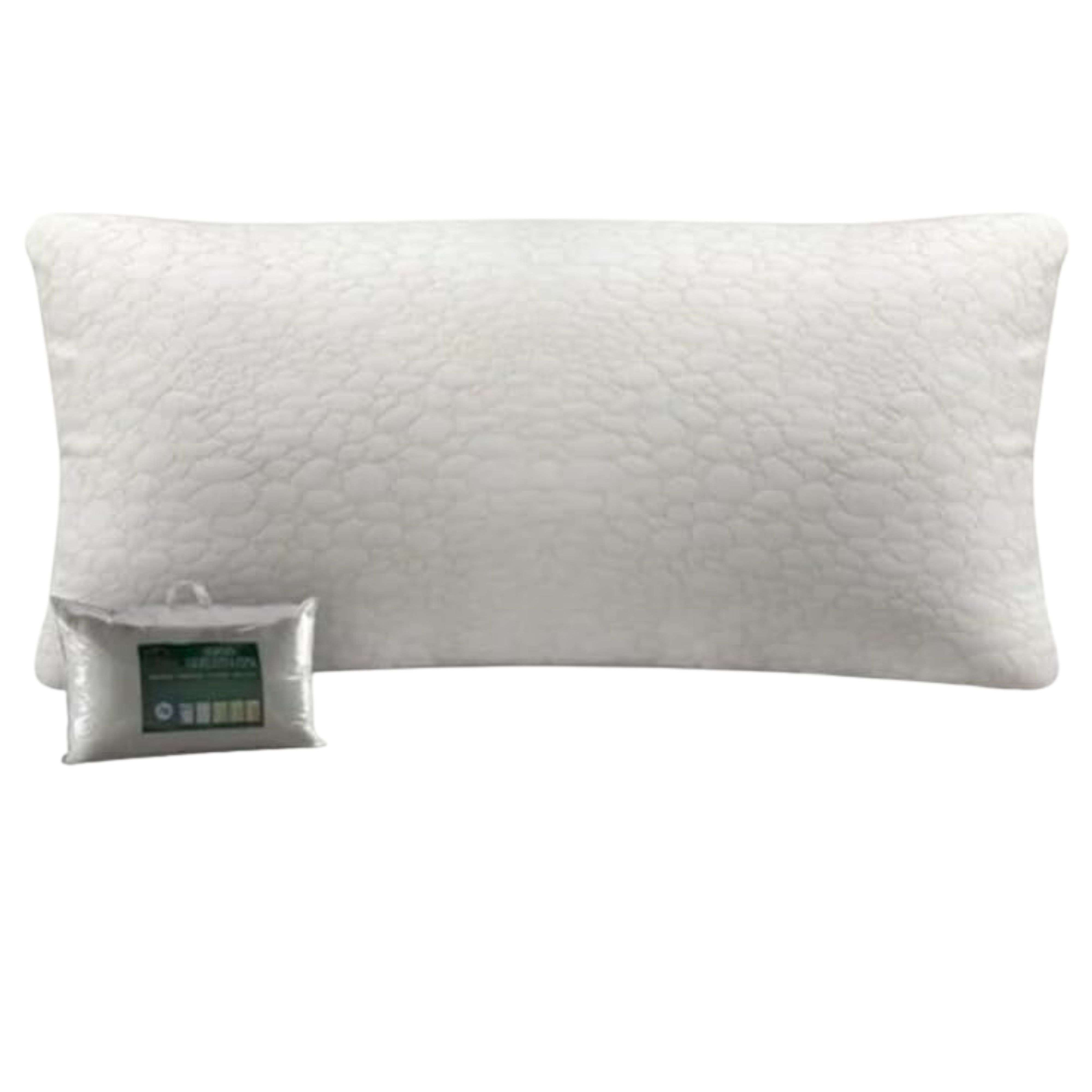 Una almohada blanca con superficie texturizada y un relleno de almohada empaquetado al lado.