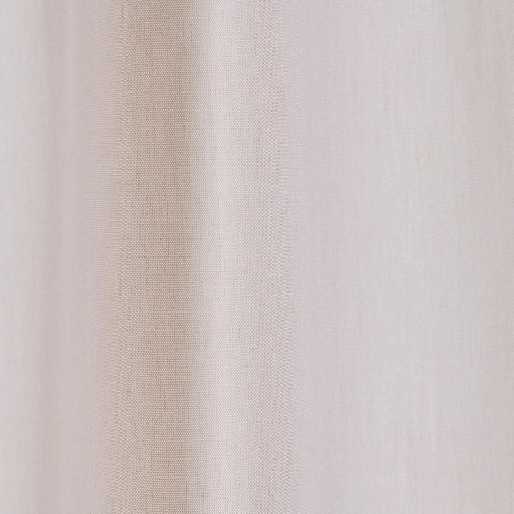 Gros plan d'un tissu beige clair avec des plis et de la texture.