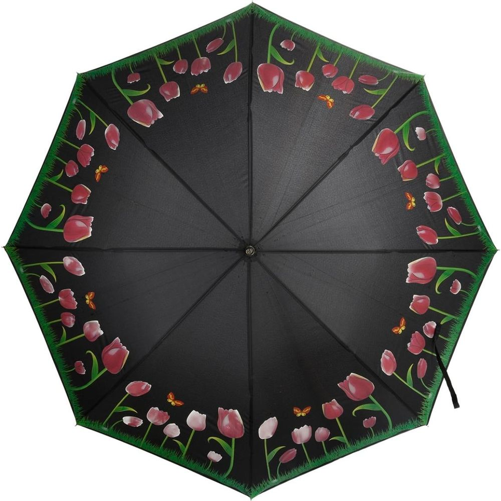 Ein schwarzer Regenschirm mit Tulpenmuster und Schmetterlingen am Rand.