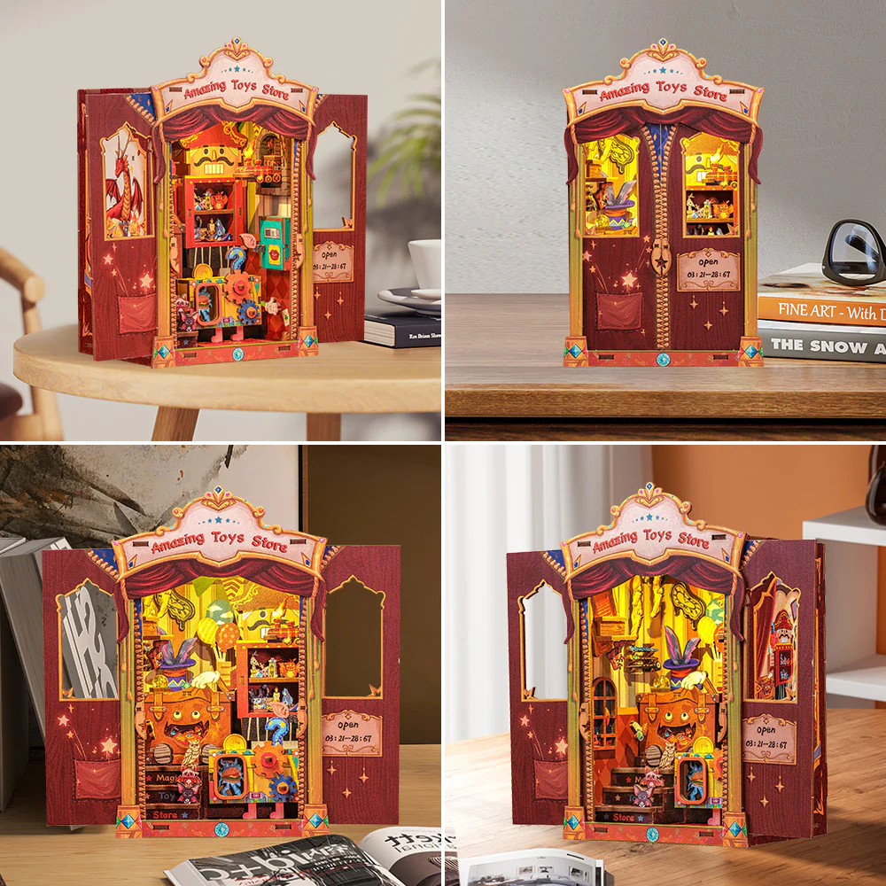 Un diorama de magasin de jouets pop-up avec rideaux rouges et détails lumineux.