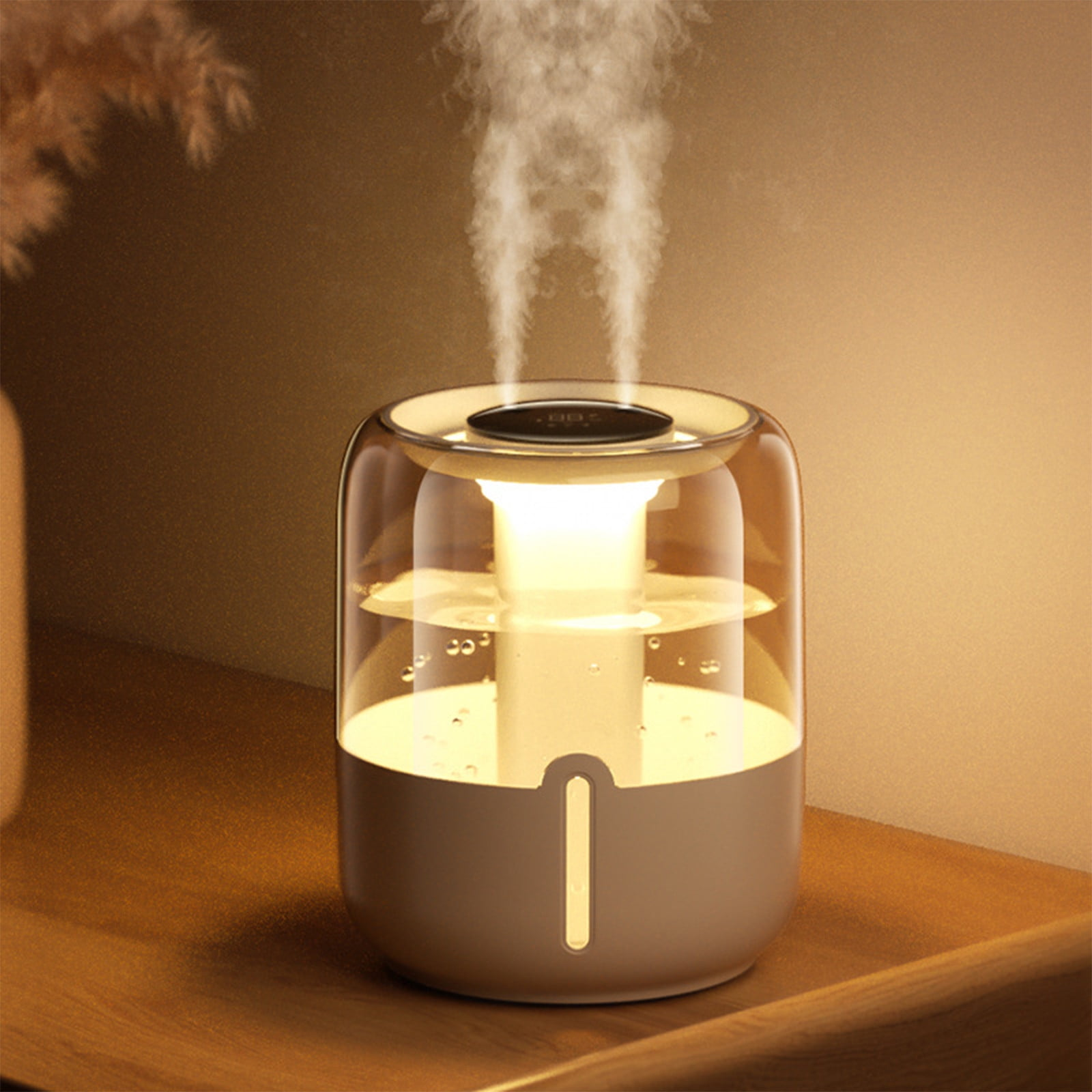 Ein aromadiffusor mit einem bernsteinfarbenen Licht und Dampf, der aufsteigt.