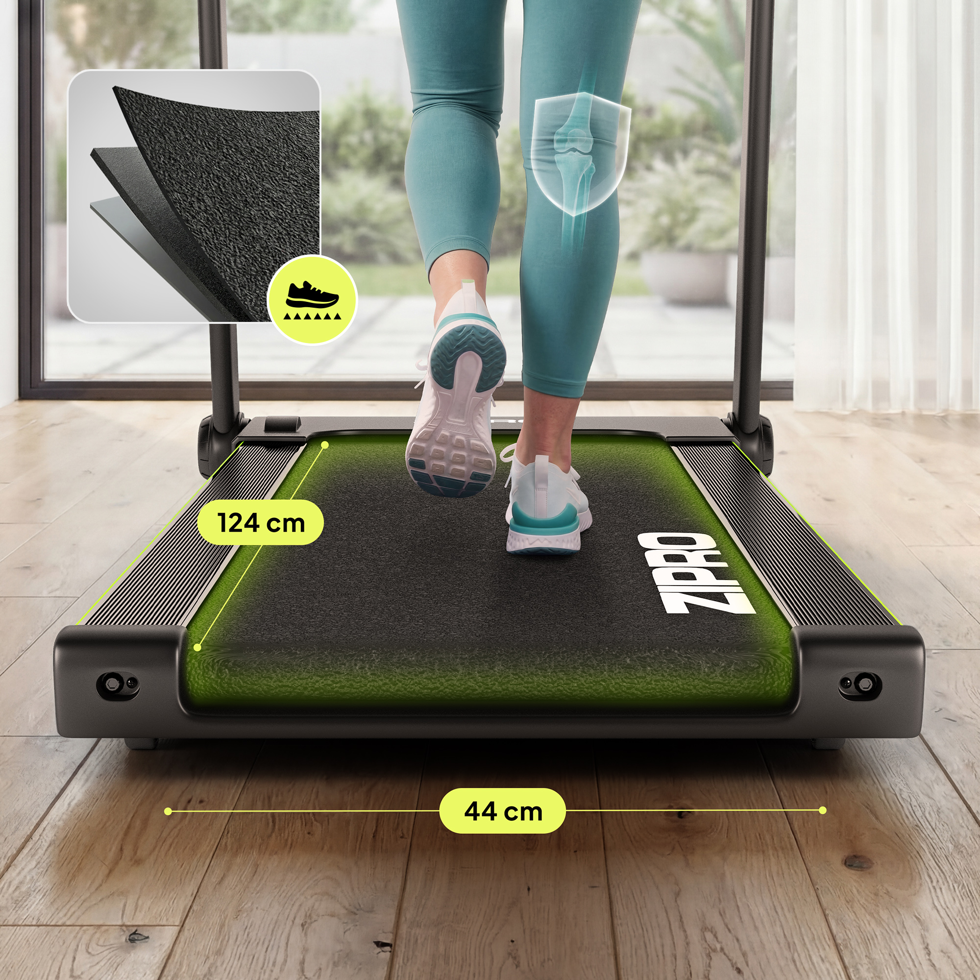 Osoba biegnie na bieżni (124cm x 44cm). Zbliżenie na warstwową matę i grafikę ochrony kolan.