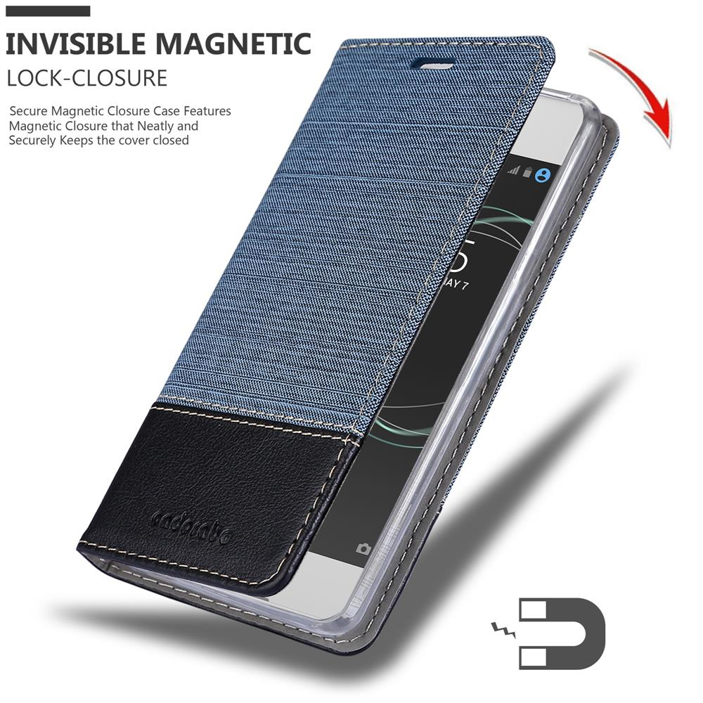 Custodia per telefono in denim blu con dettaglio in pelle nera e chiusura magnetica.
