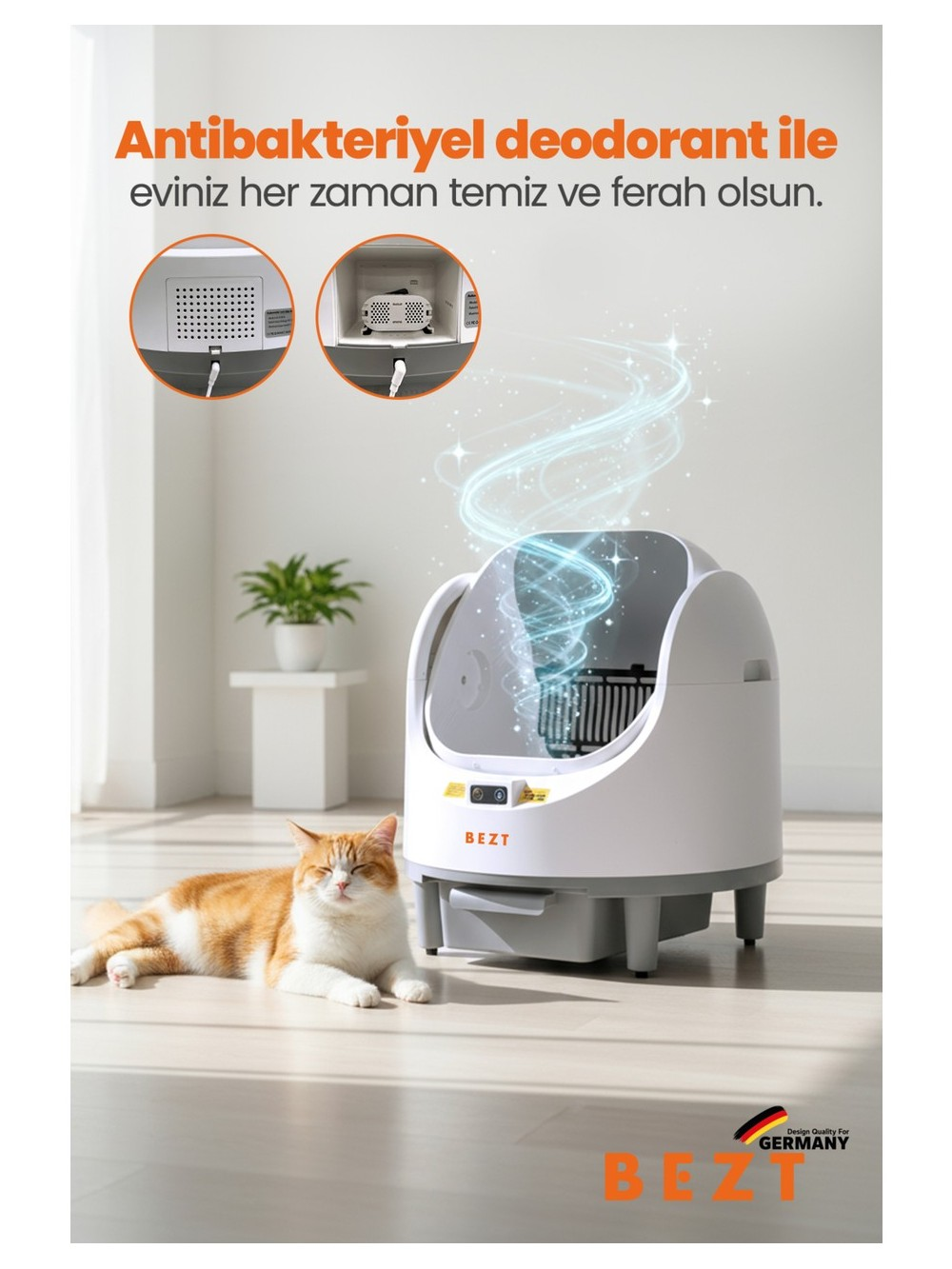 Turuncu-beyaz bir kedi, mavi dumanı olan beyaz otomatik kedi tuvaletinin yanında yatıyor.