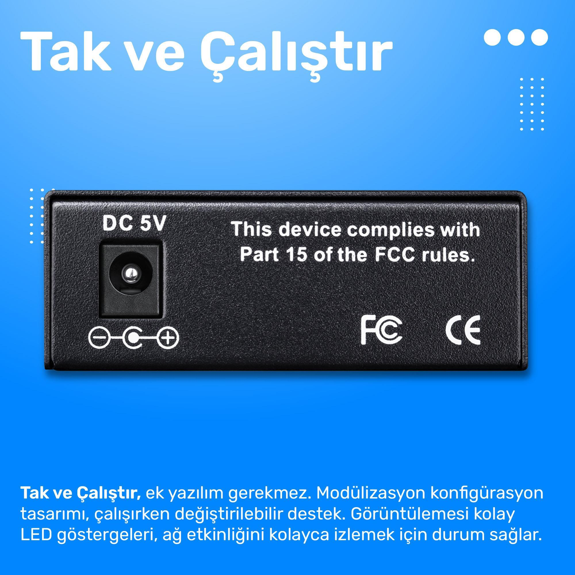 DC 5V girişli, FCC ve CE logolu siyah cihaz. Mavi arka plan.