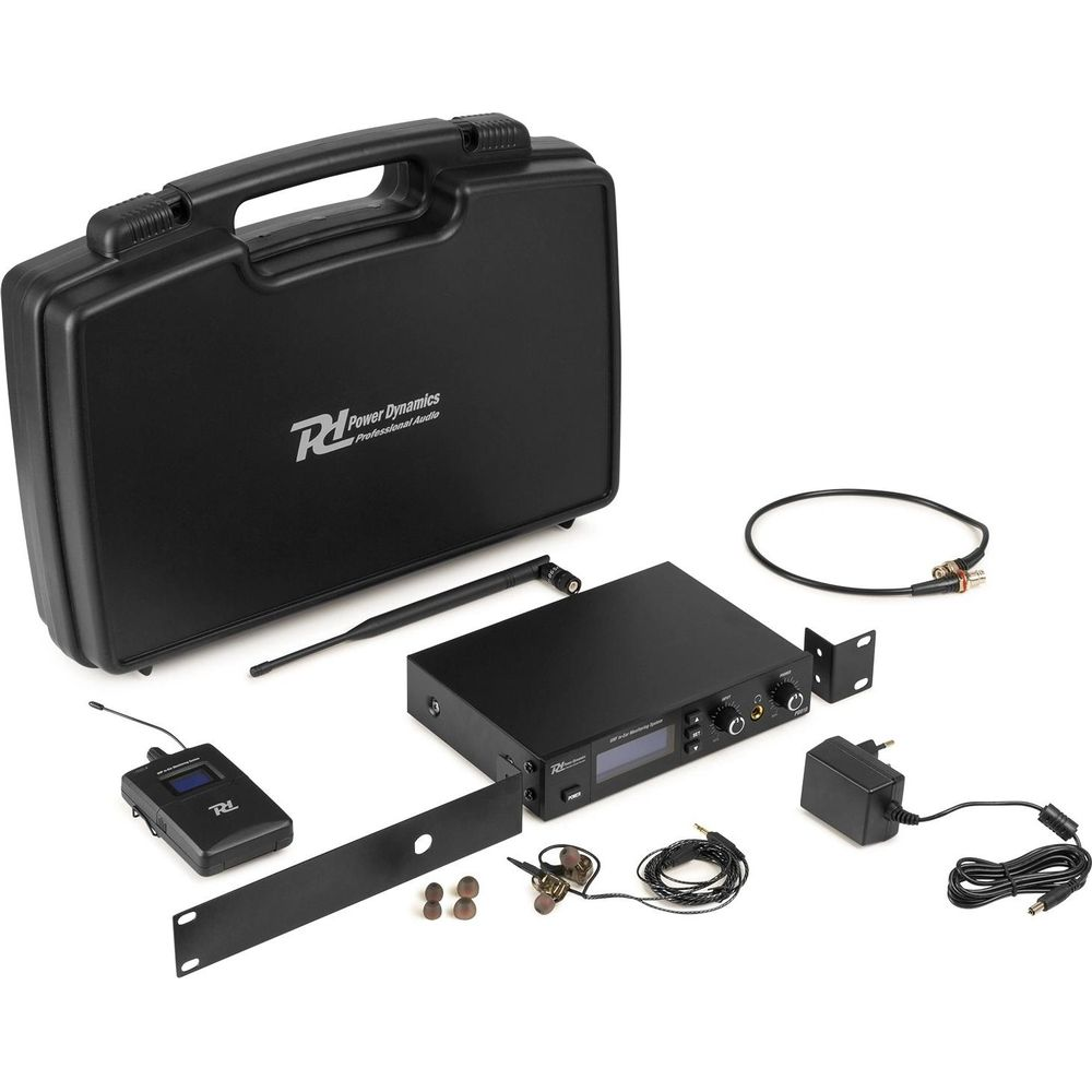 Equipo de audio negro: maletín, receptor, transmisor, antena, cables, auriculares.