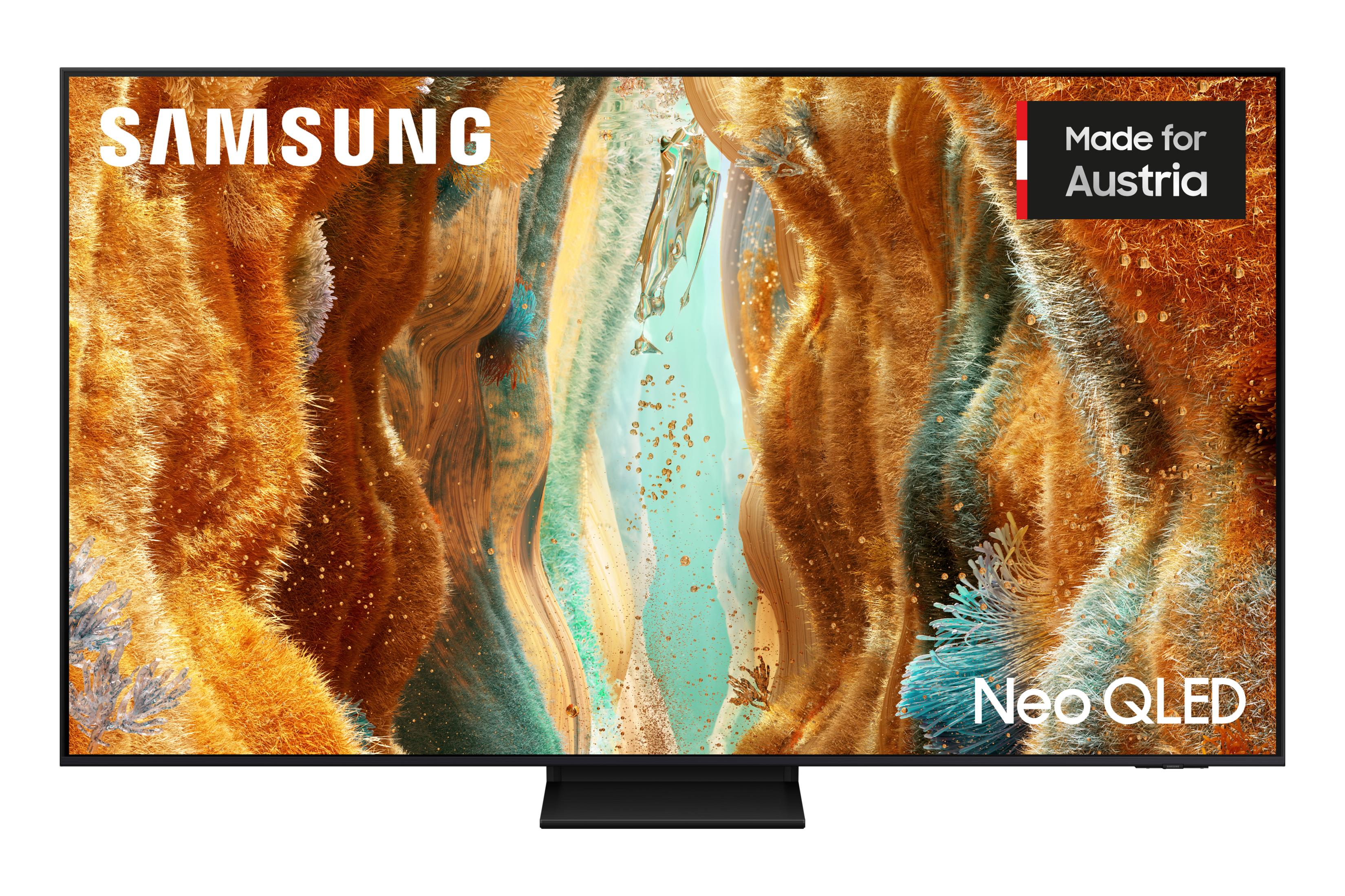 Een Samsung Neo QLED TV met abstracte kunst en een "Made for Austria"-label.