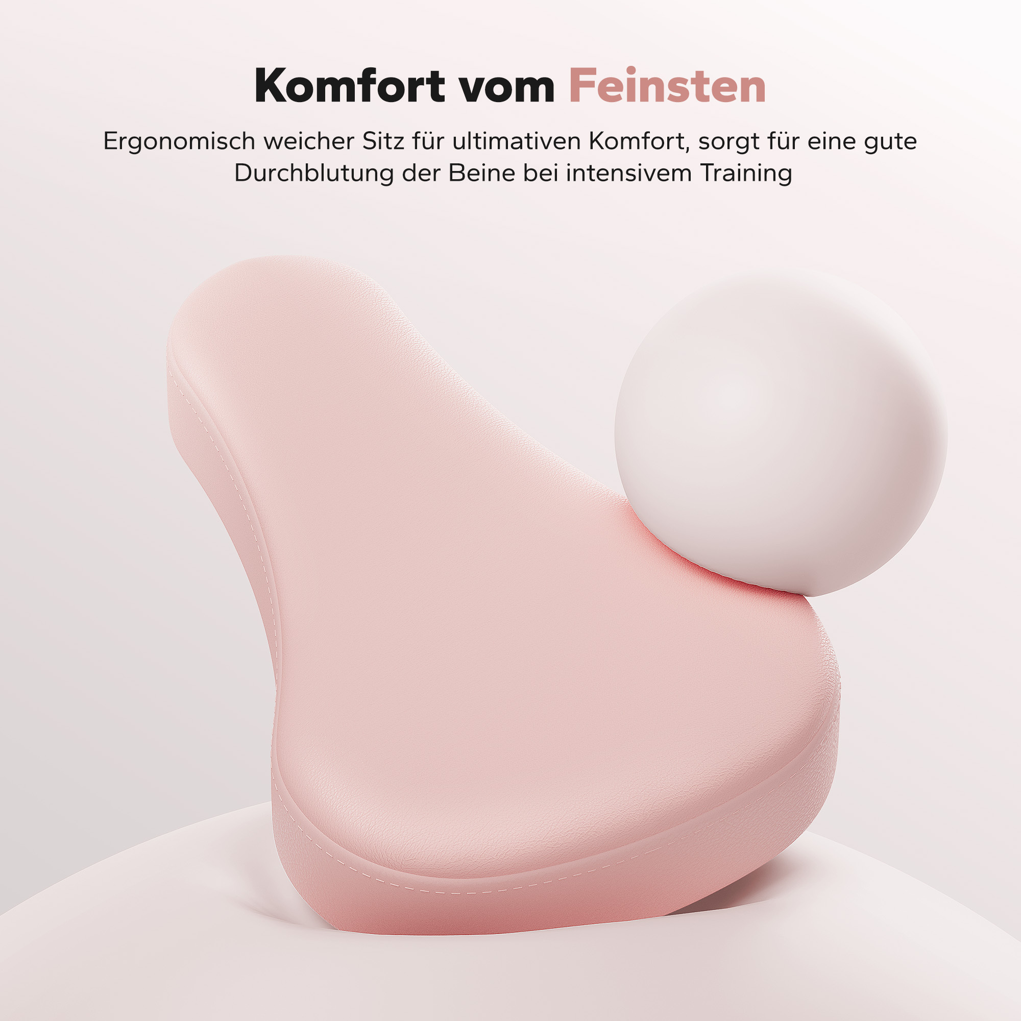 Ein rosafarbener, ergonomischer Fahrradsitz mit einem weißen Ball daneben.